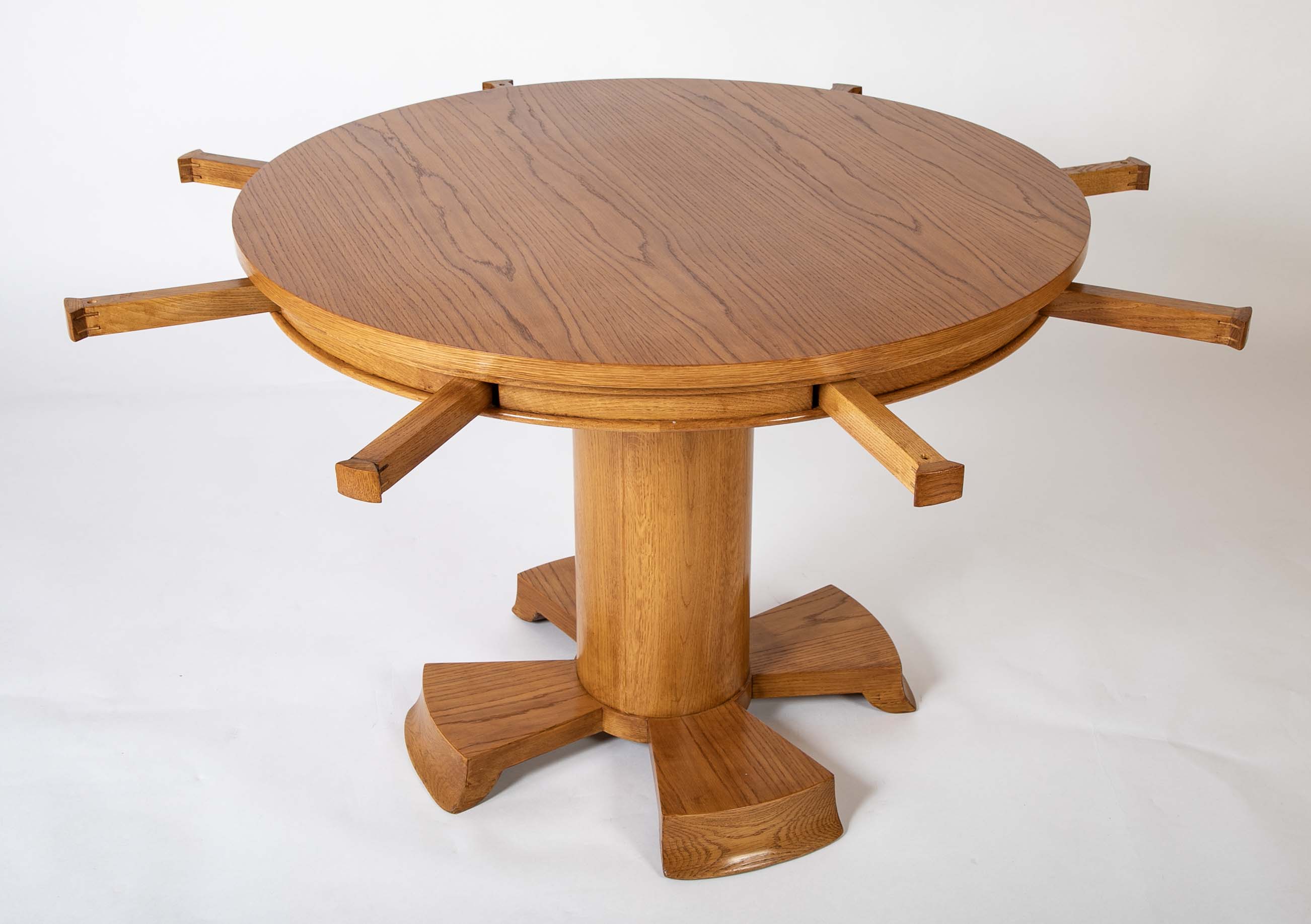 A Oak Expandable Dining Table In The Manner of Jules Leleu