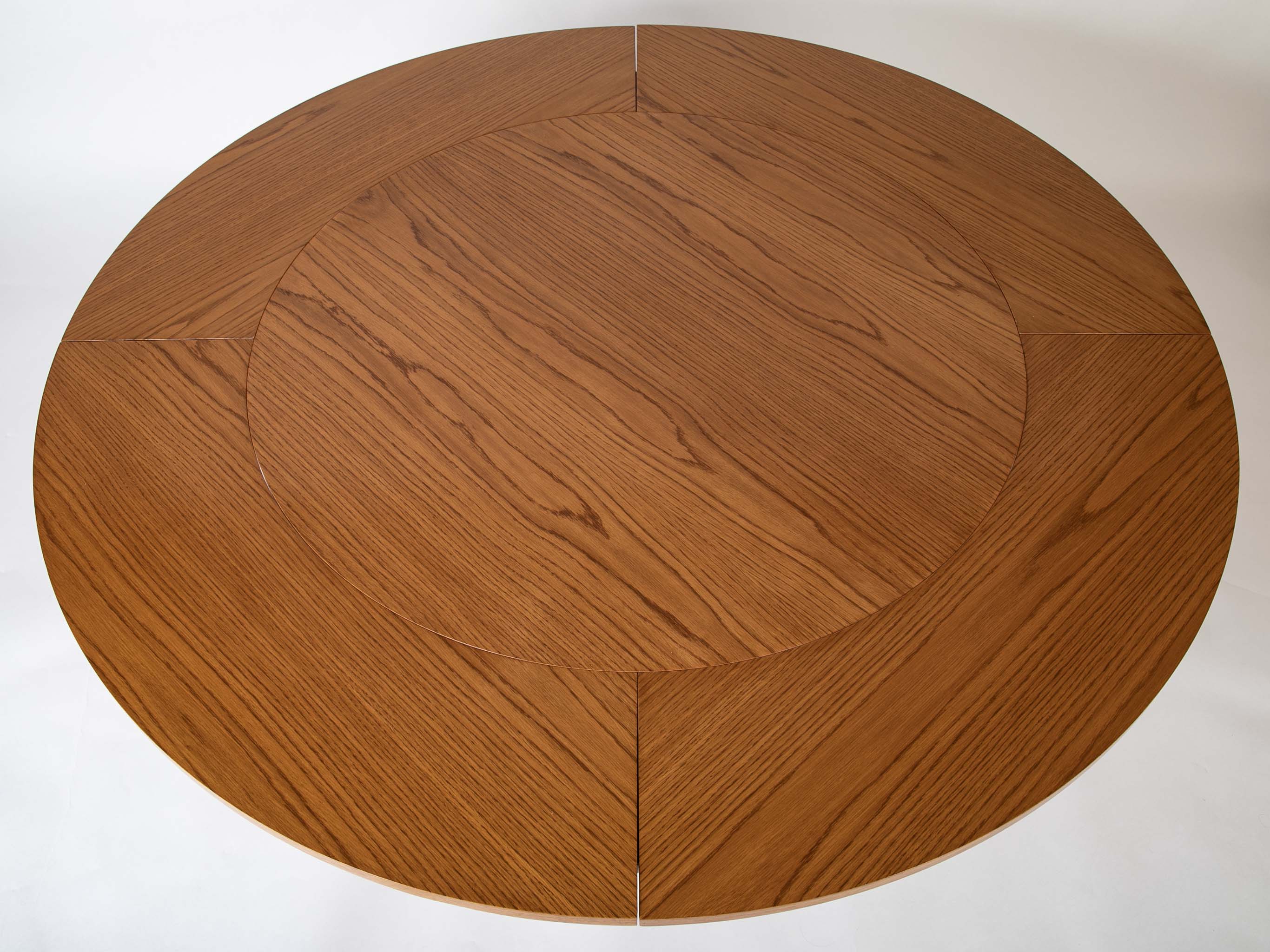 A Oak Expandable Dining Table In The Manner of Jules Leleu