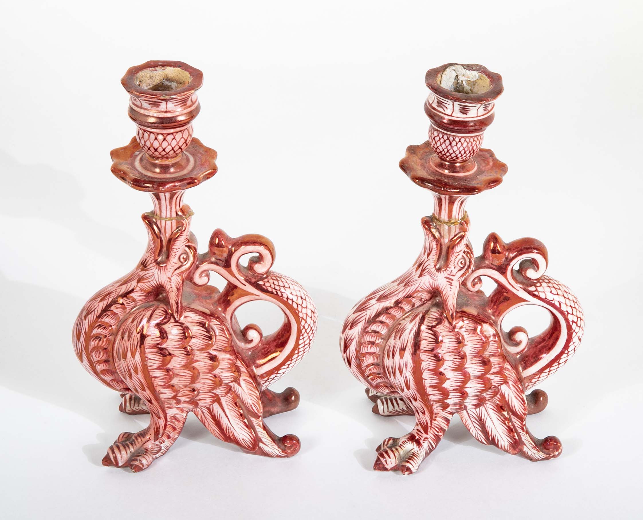 Pair of Ruby Luster Ware of Griffin Candle Sticks