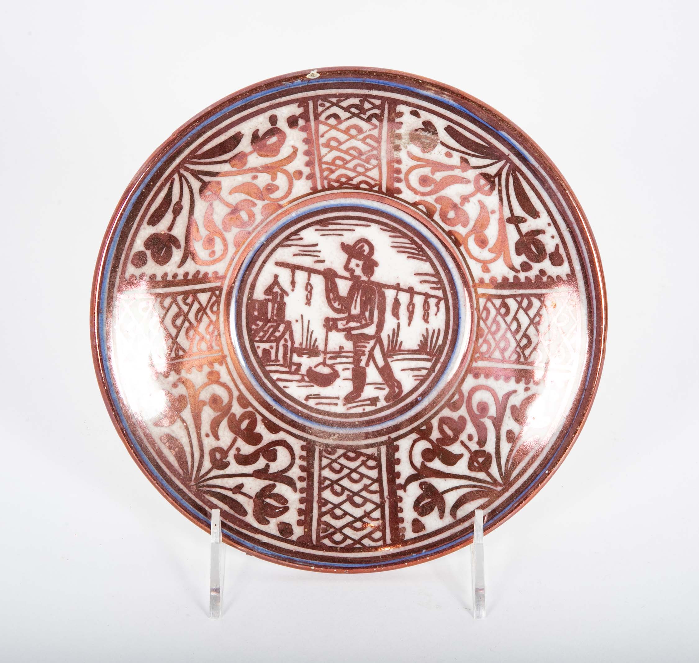 Ruby Lustre Ware Plate with Man Carrying Bird on a Stick