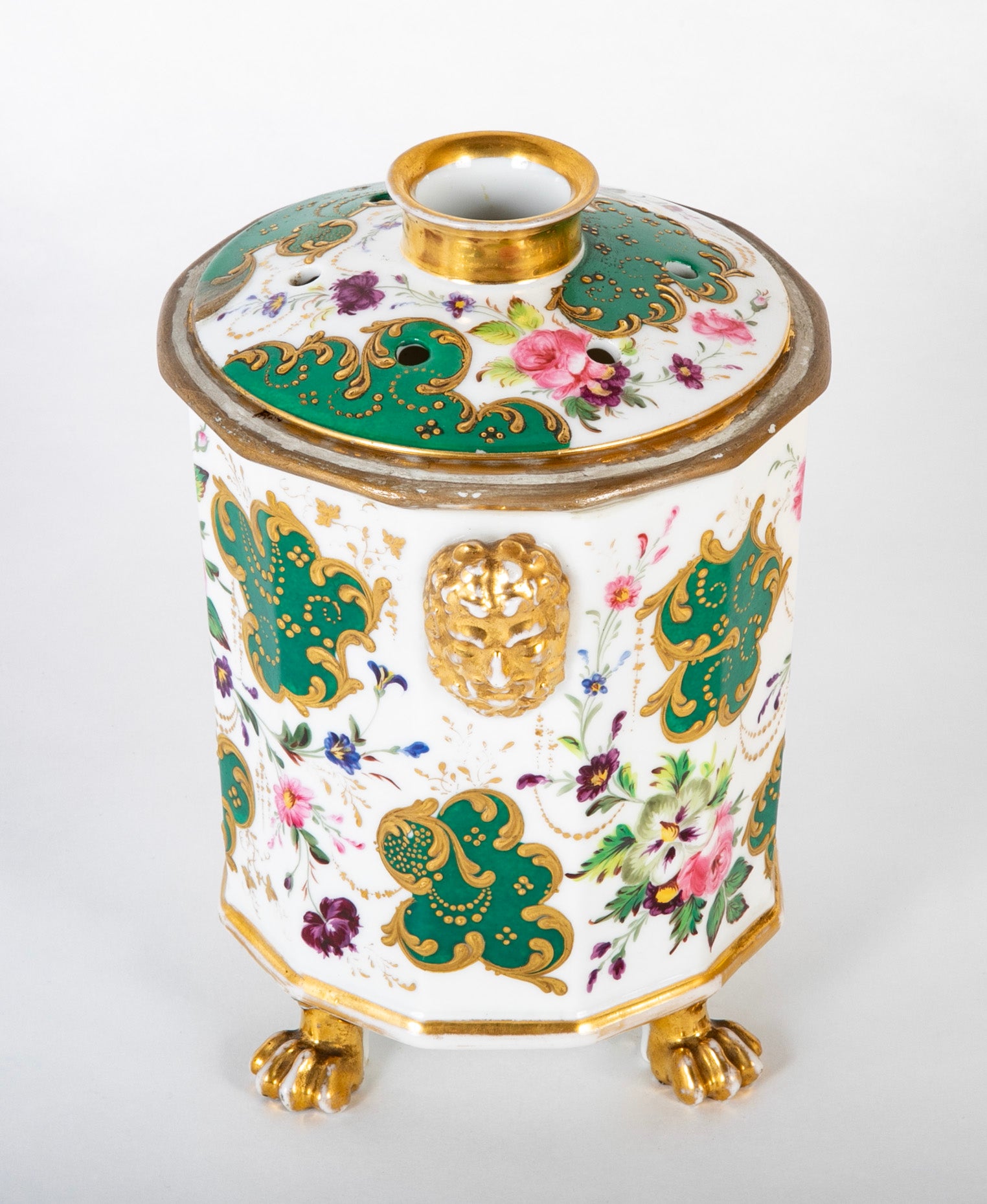A Paris Porcelain Bulb Pot with Satyr Head Handles & Floral Decor