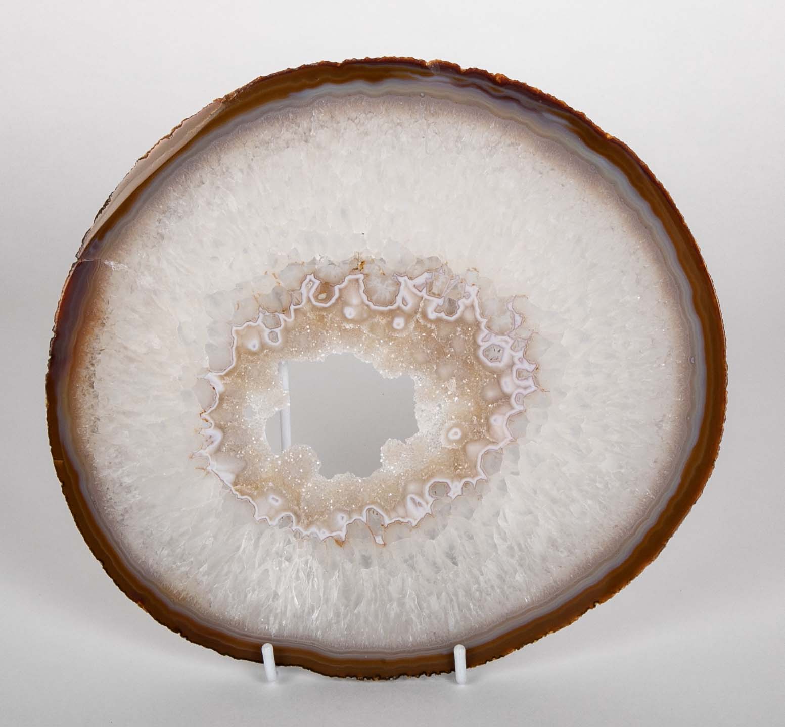 Predominantly White Polished Agate Slice on Stand
