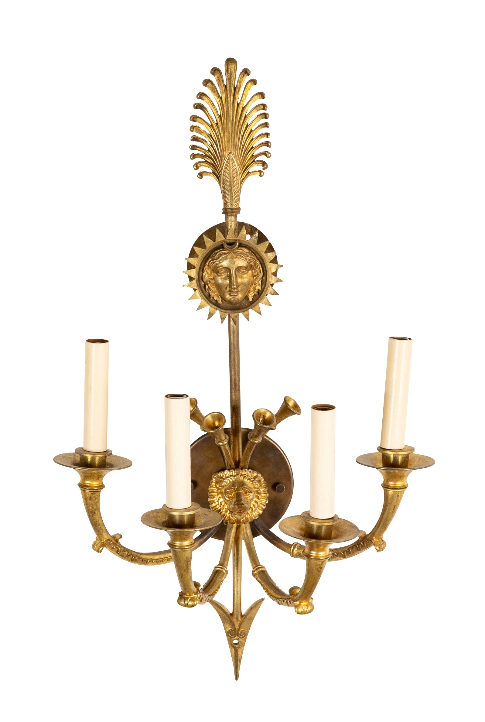 A Pair of Cast Brass Sconces in the Form of an Arrow with Face
