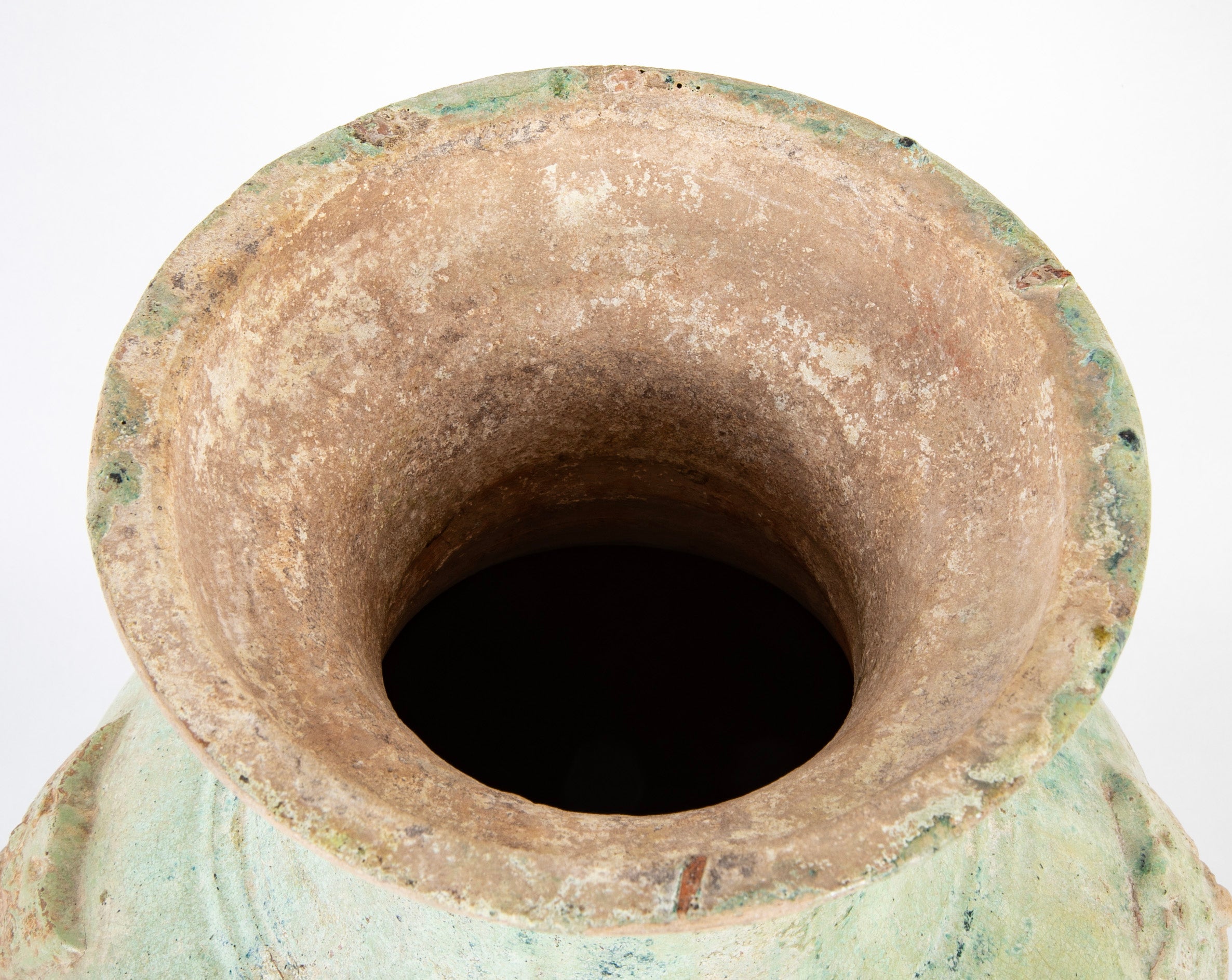 Han Dynasty Pottery Jar with Green Glaze and Molded Masks as Applied Handles