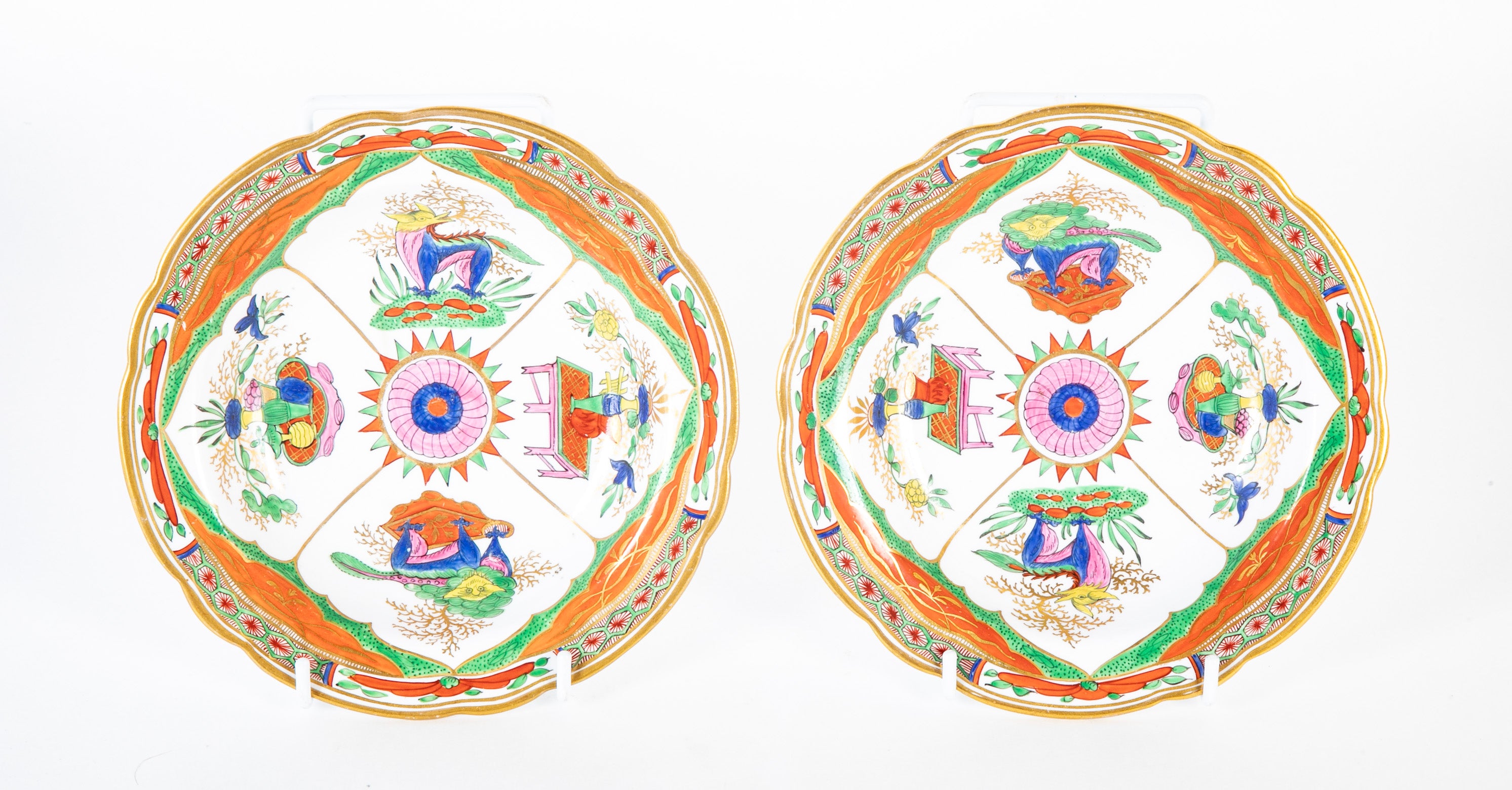 A Pair of Coalport Porcelain "Dragons in Compartments" Plates