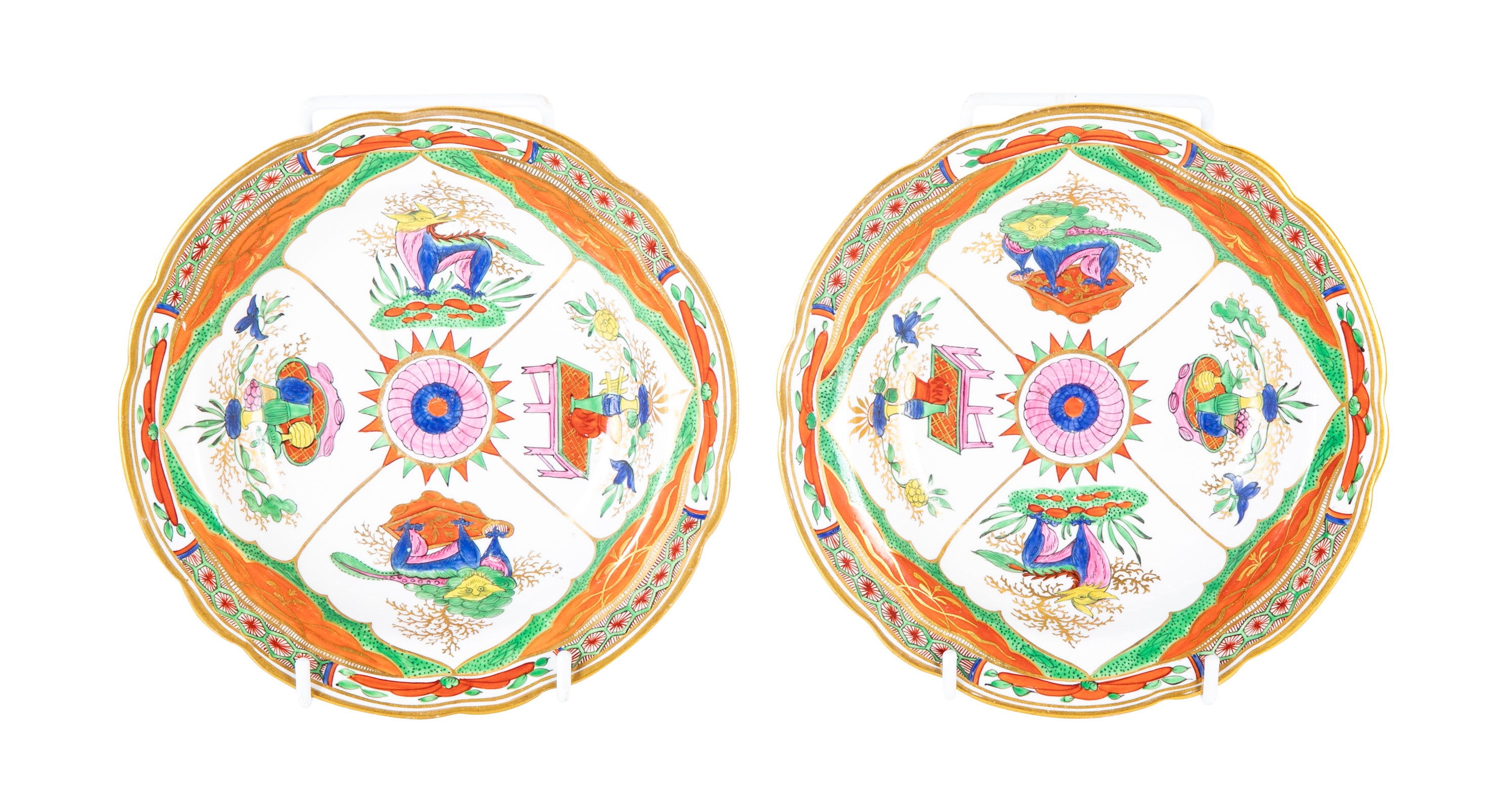 A Pair of Coalport Porcelain "Dragons in Compartments" Plates