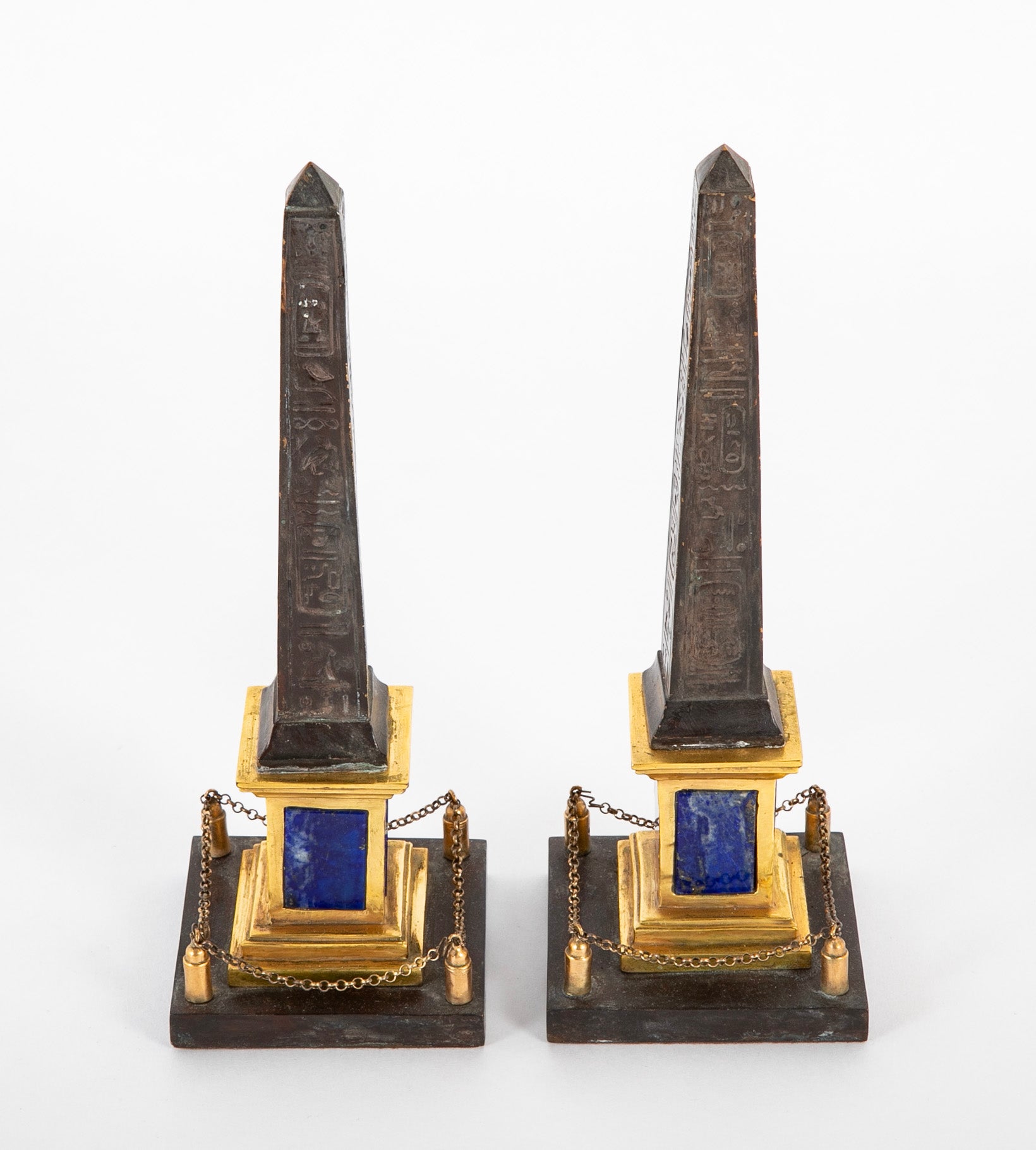 Pair of Patinated and Gilt Hieroglyphed Roman Obelisks
