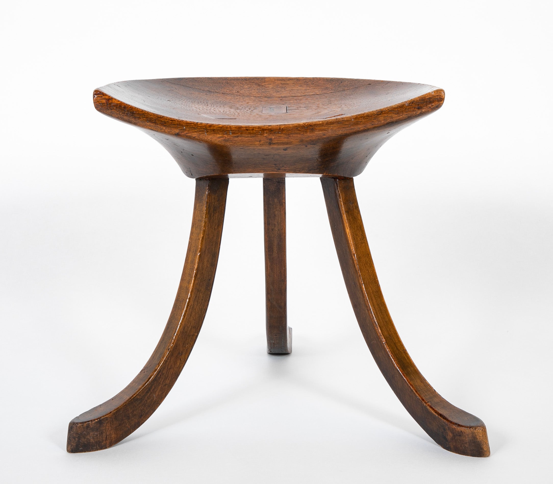 SOLD - 3/22/24. An Austrian 3 Legged Mahogany Stool Attributed to Adolf Loos