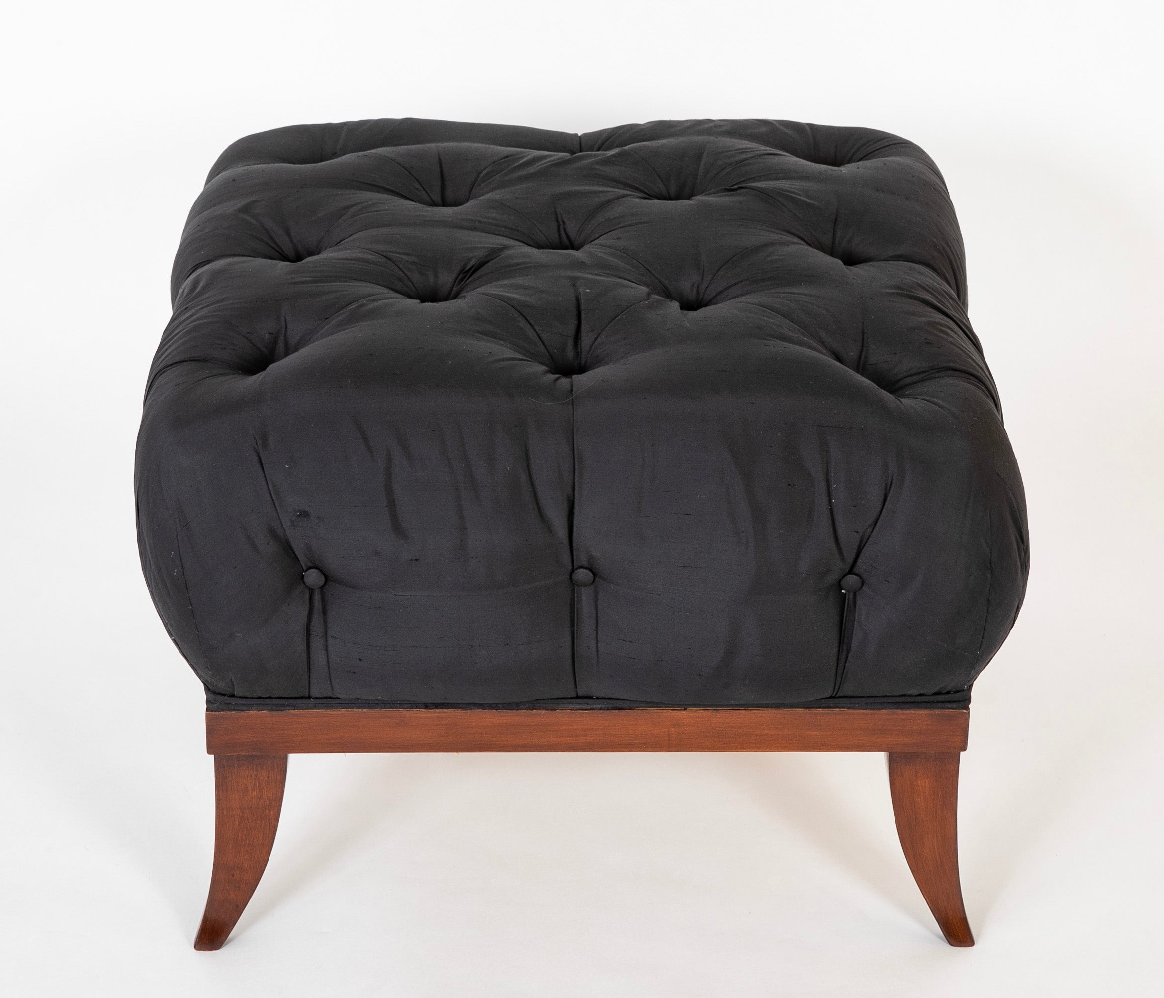 Voluptuously Upholstered Saber Leg Stool