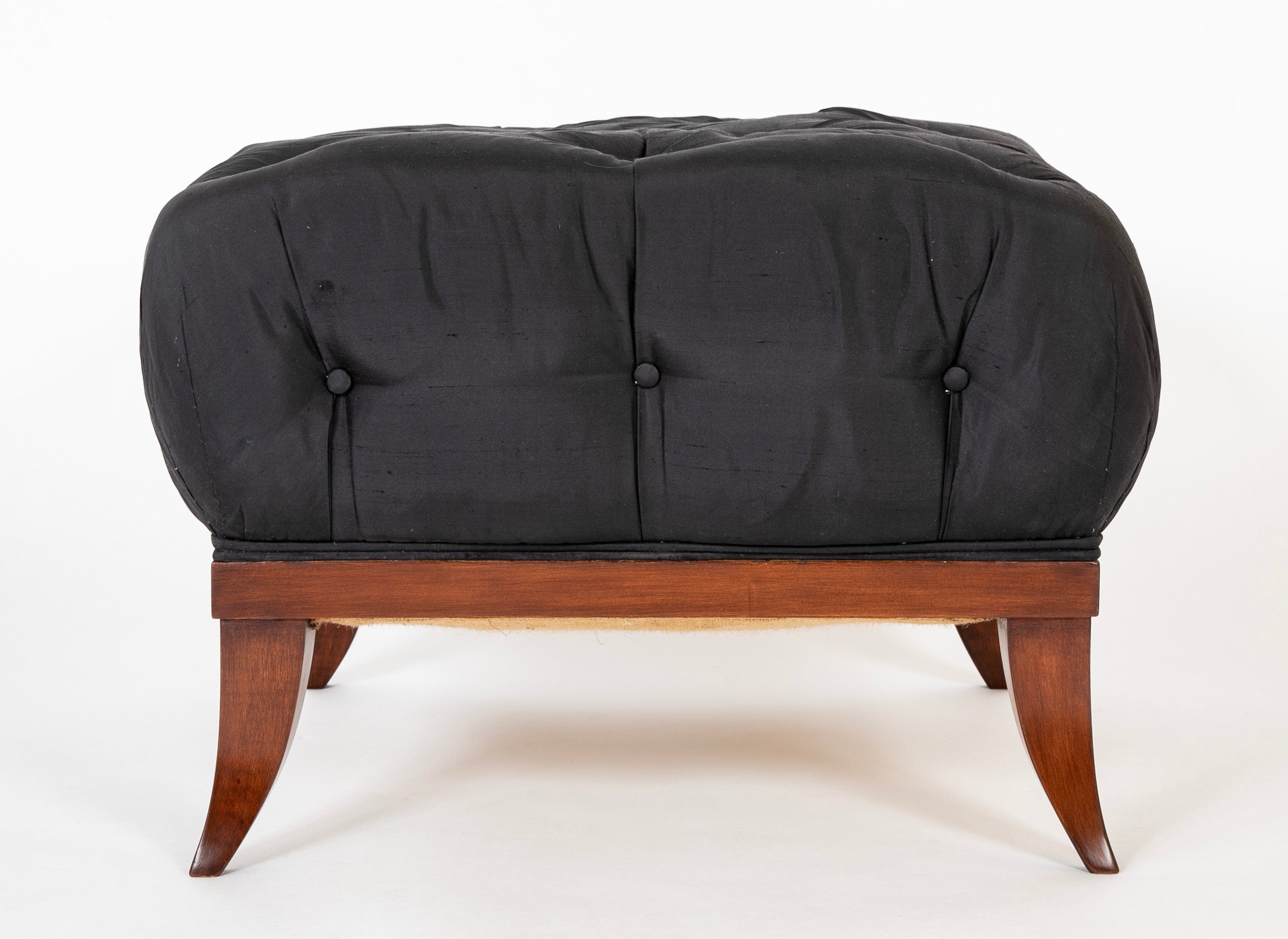 Voluptuously Upholstered Saber Leg Stool