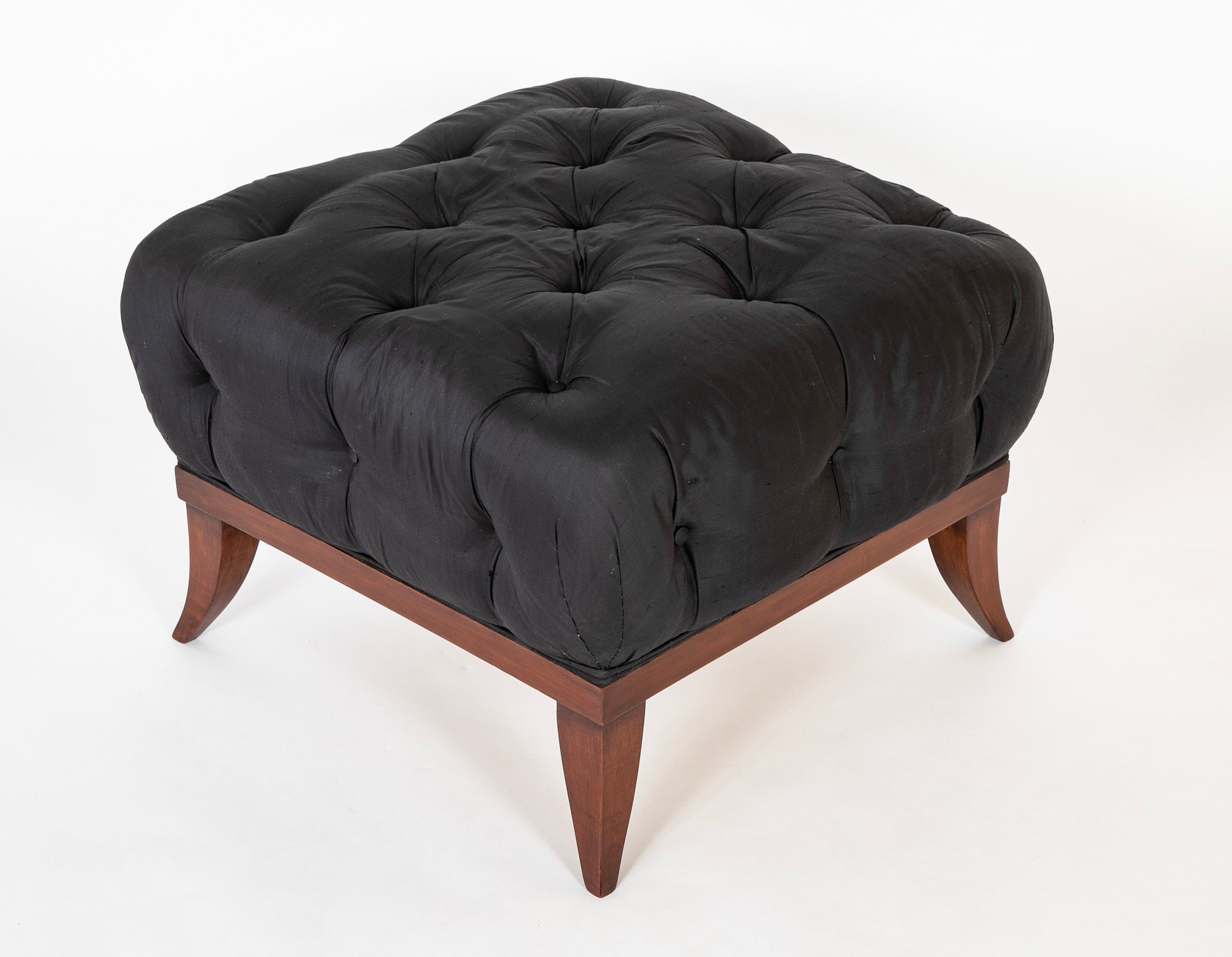 Voluptuously Upholstered Saber Leg Stool