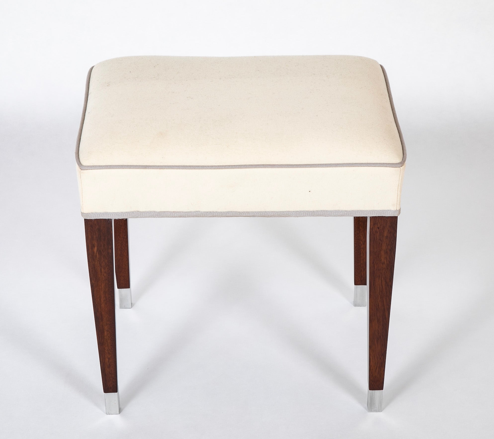 A Pair of Upholstered Stools by Jacques Adnet