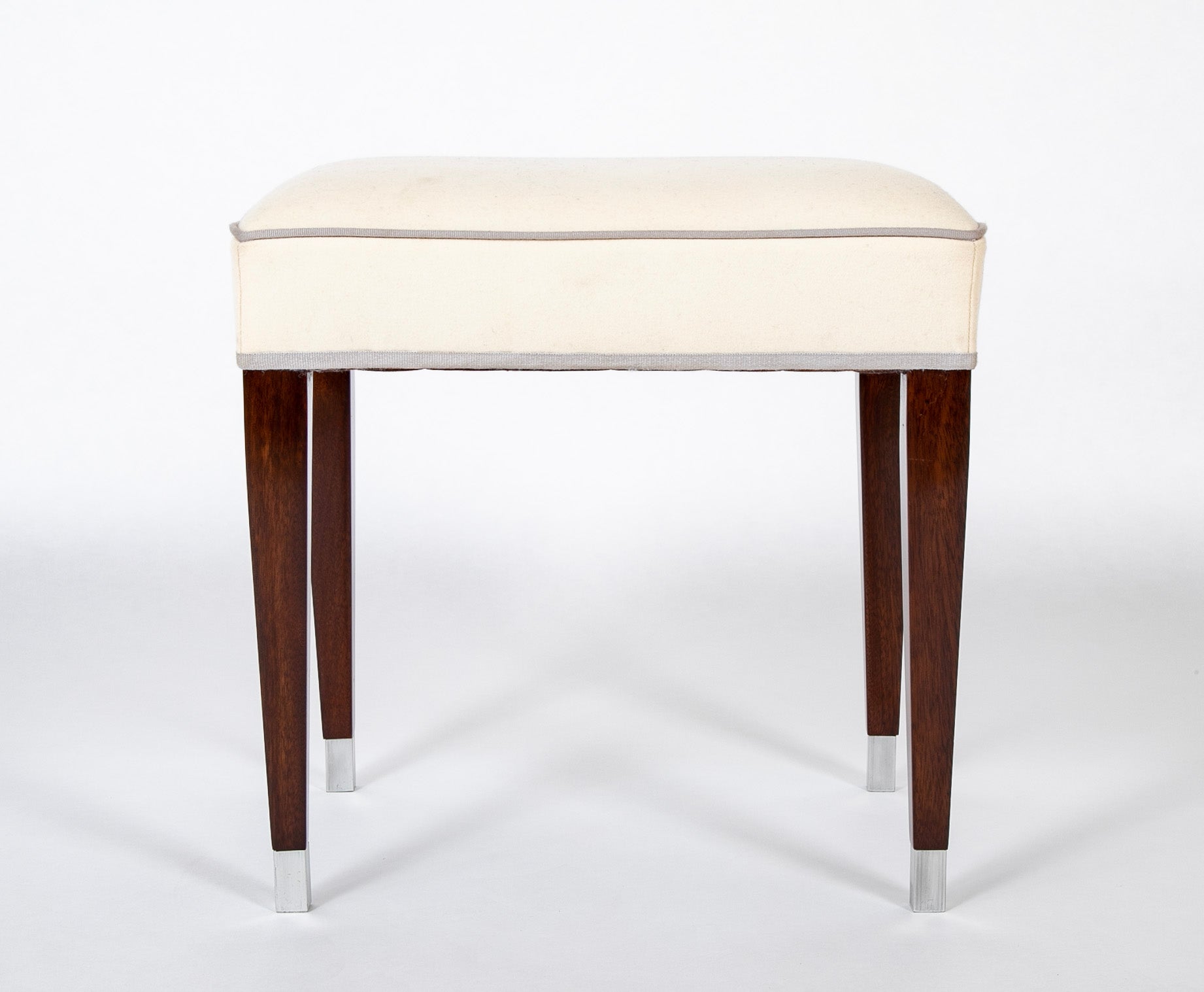 A Pair of Upholstered Stools by Jacques Adnet