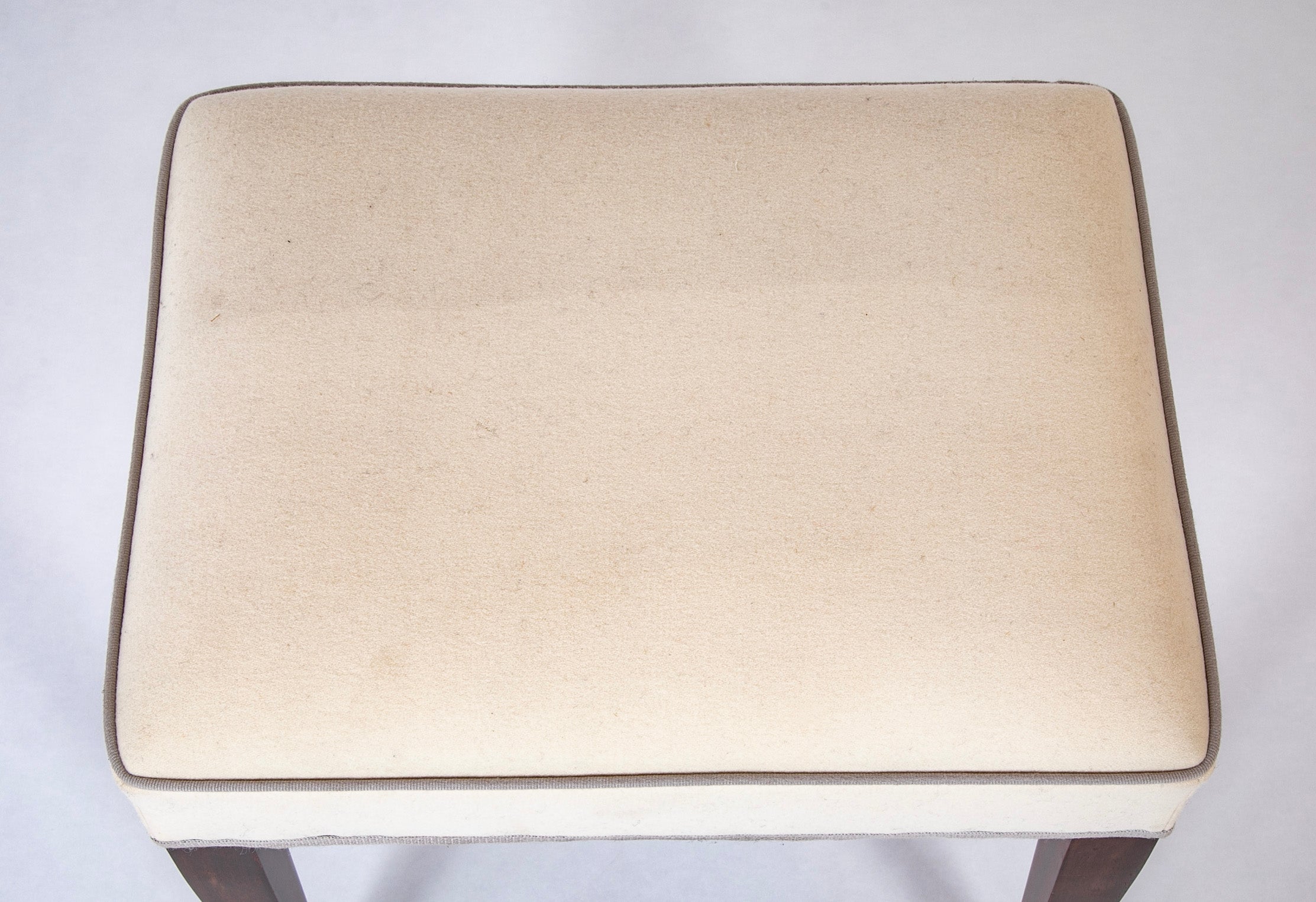 A Pair of Upholstered Stools by Jacques Adnet