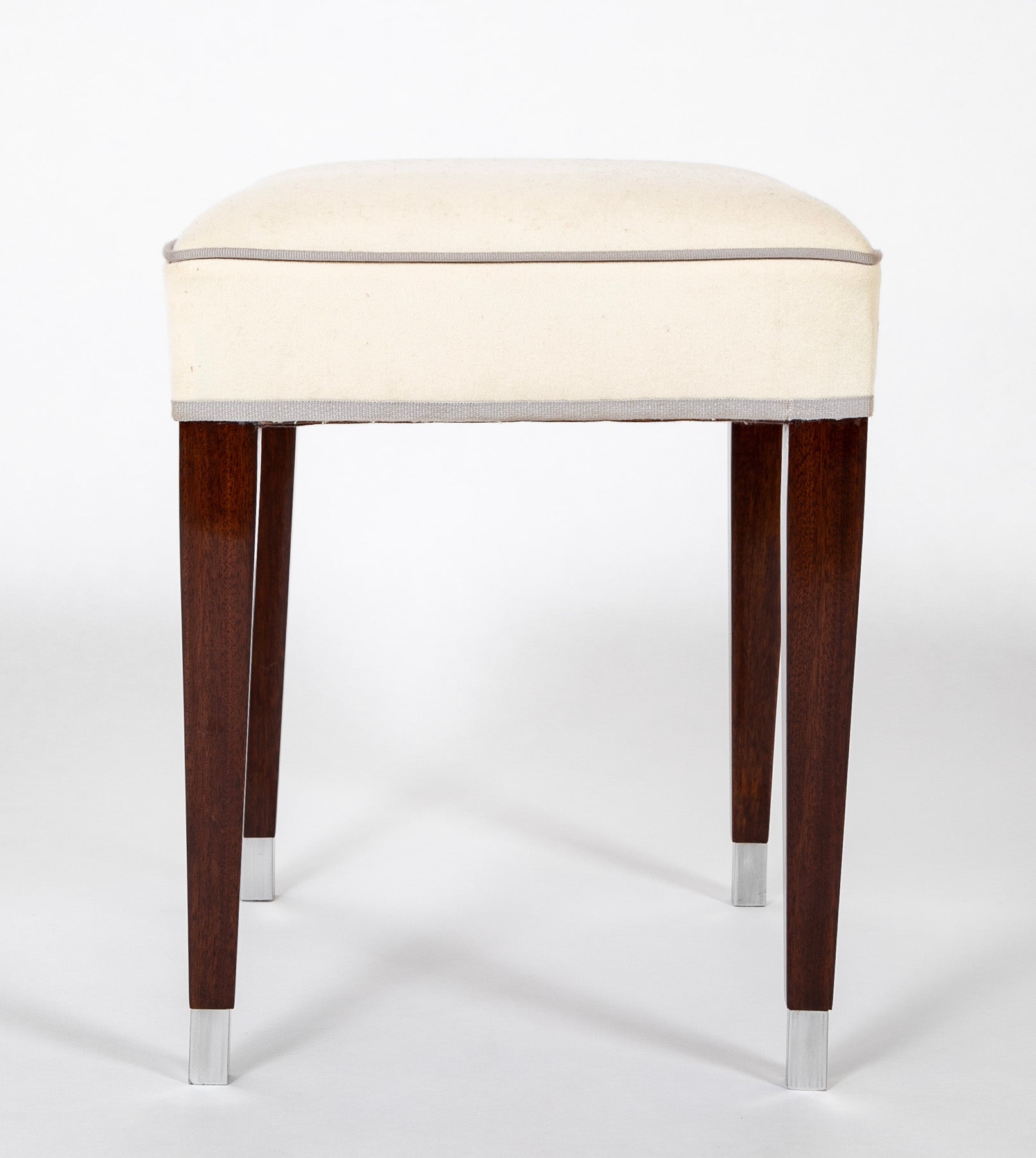 A Pair of Upholstered Stools by Jacques Adnet