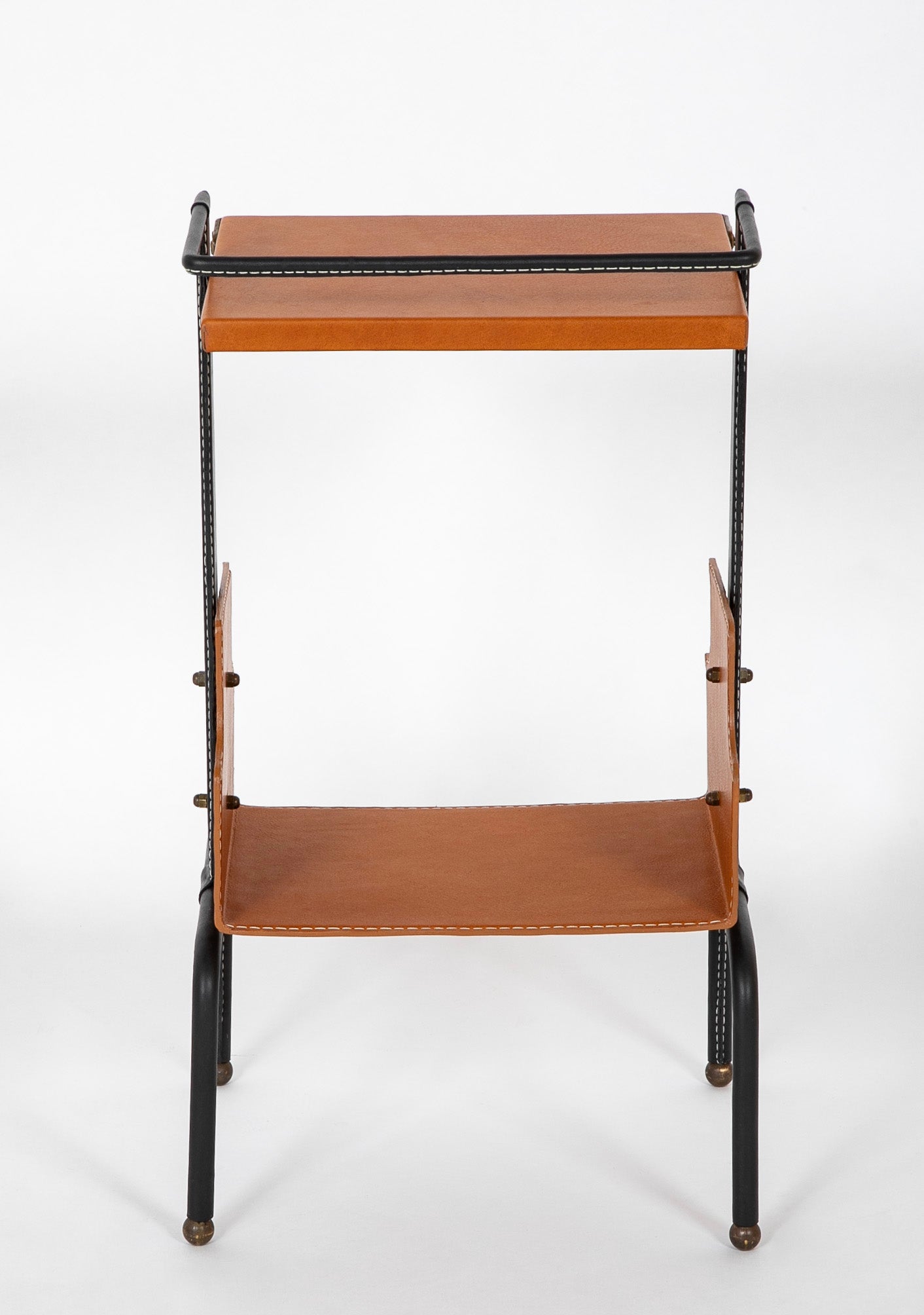 A Jacques Adnet Black and Cognac Leather over Metal Frame Table