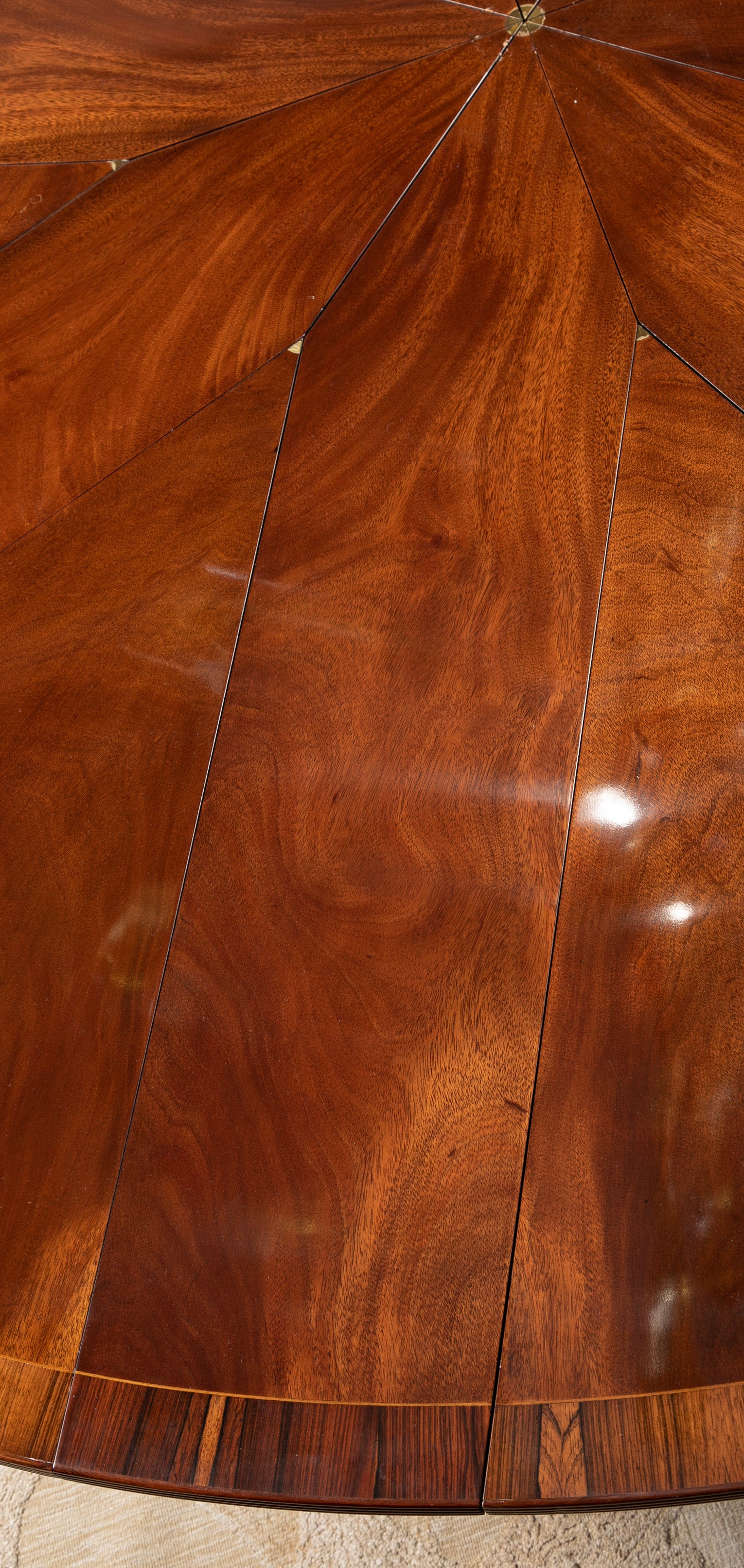 A Regency Style Jupe Dining Table in Mahogany