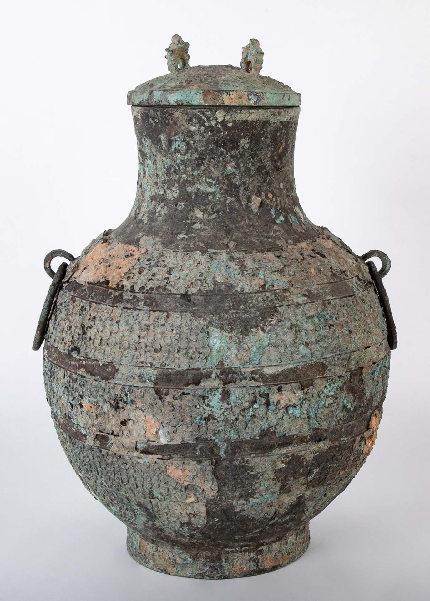 A Pair of Chinese "Warring States" Period Bronze Lidded Wine Vessels