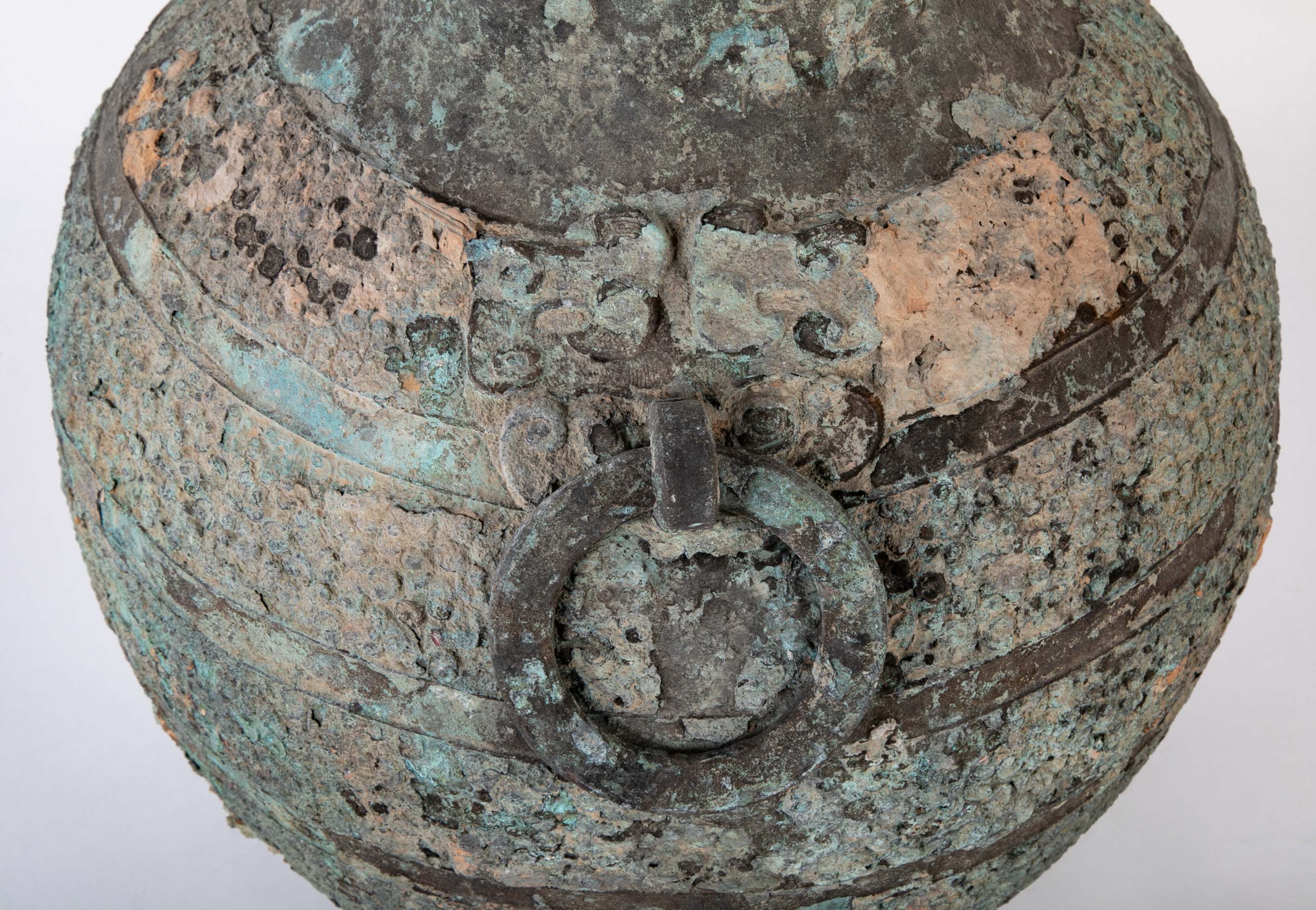 A Pair of Chinese "Warring States" Period Bronze Lidded Wine Vessels