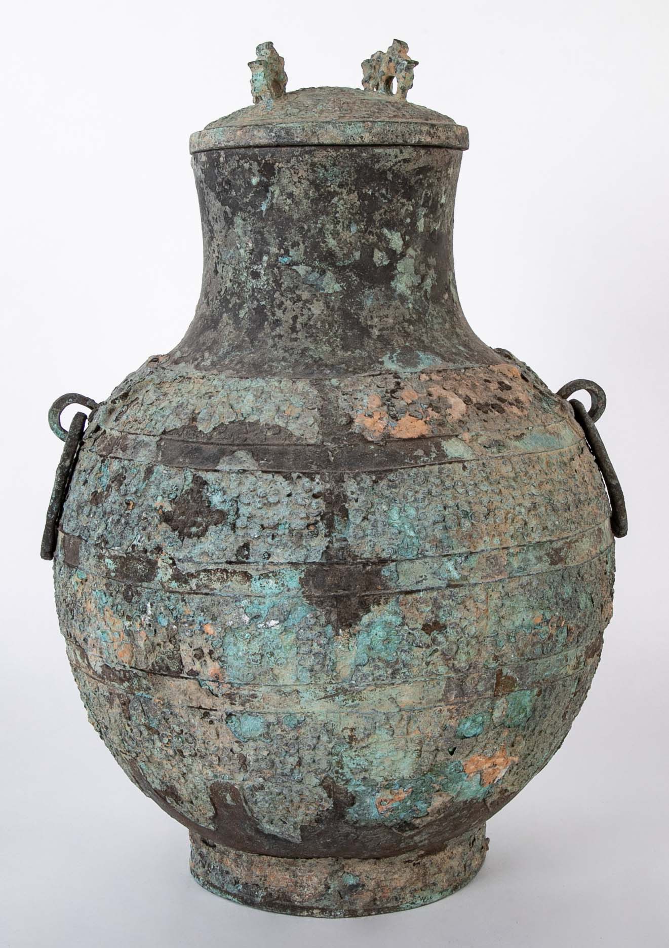 A Pair of Chinese "Warring States" Period Bronze Lidded Wine Vessels