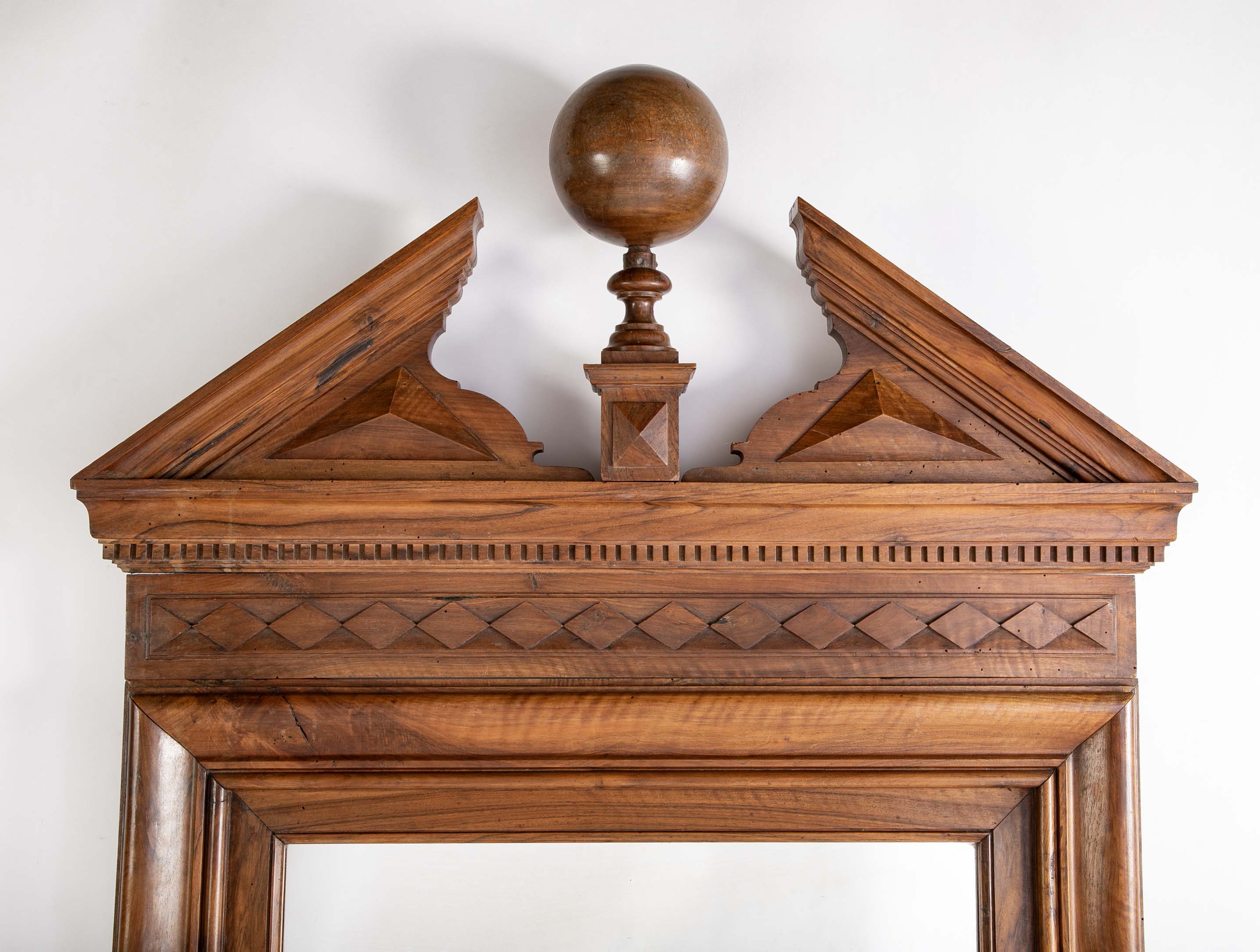 A Large 19th Century Neoclassical Carved Walnut Mirror