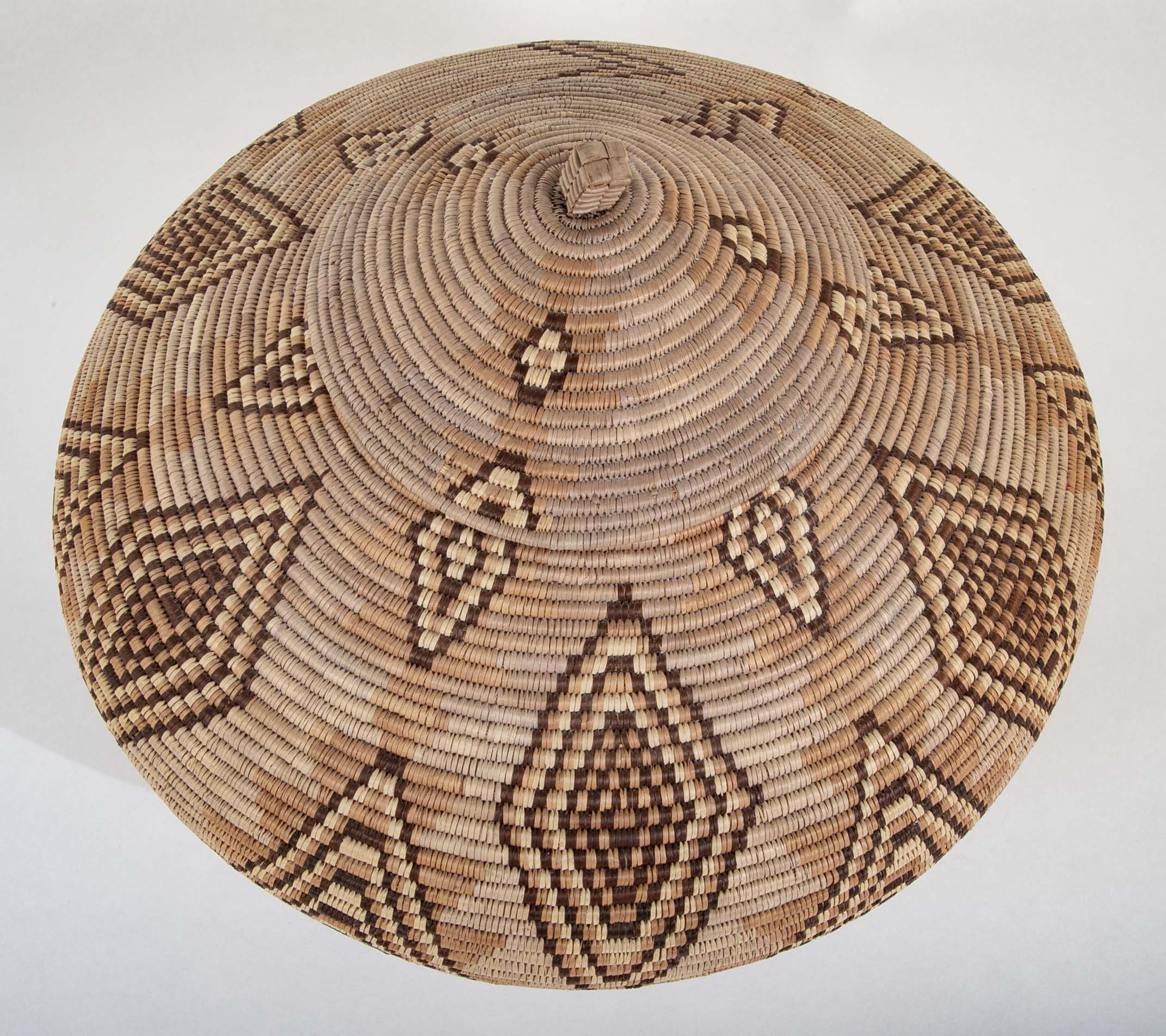 A Zulu Coiled Basket with Lid in Geometric Pattern