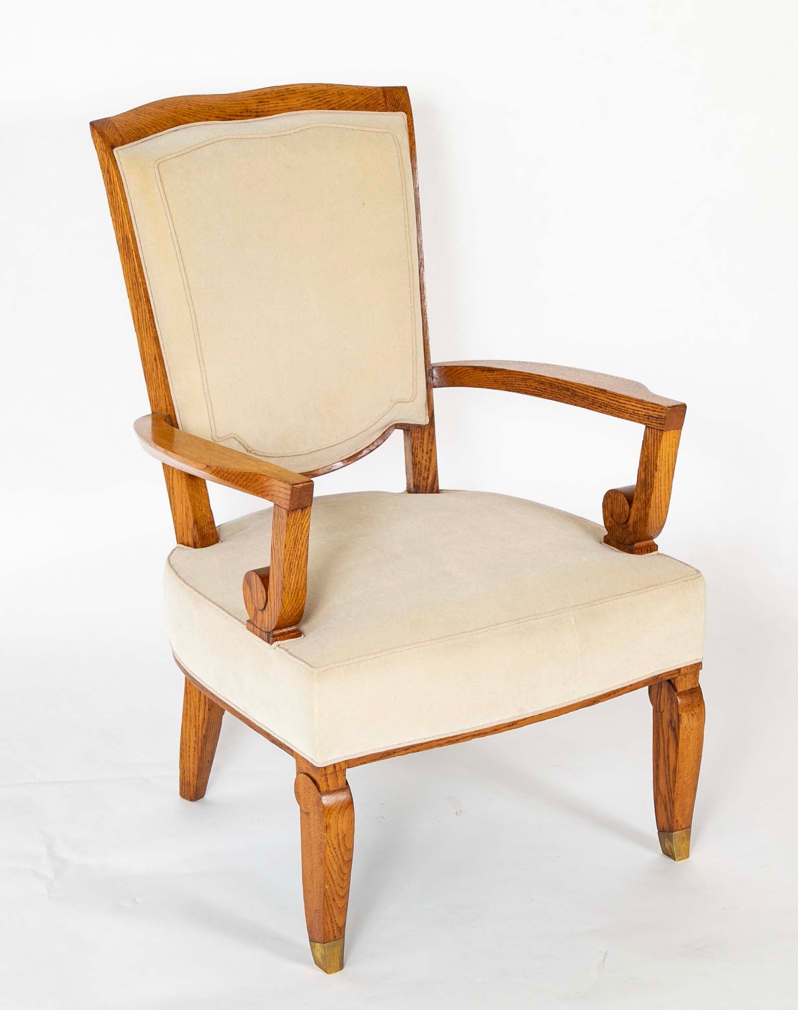 Pair of Jules Leleu Waxed Oak Armchairs