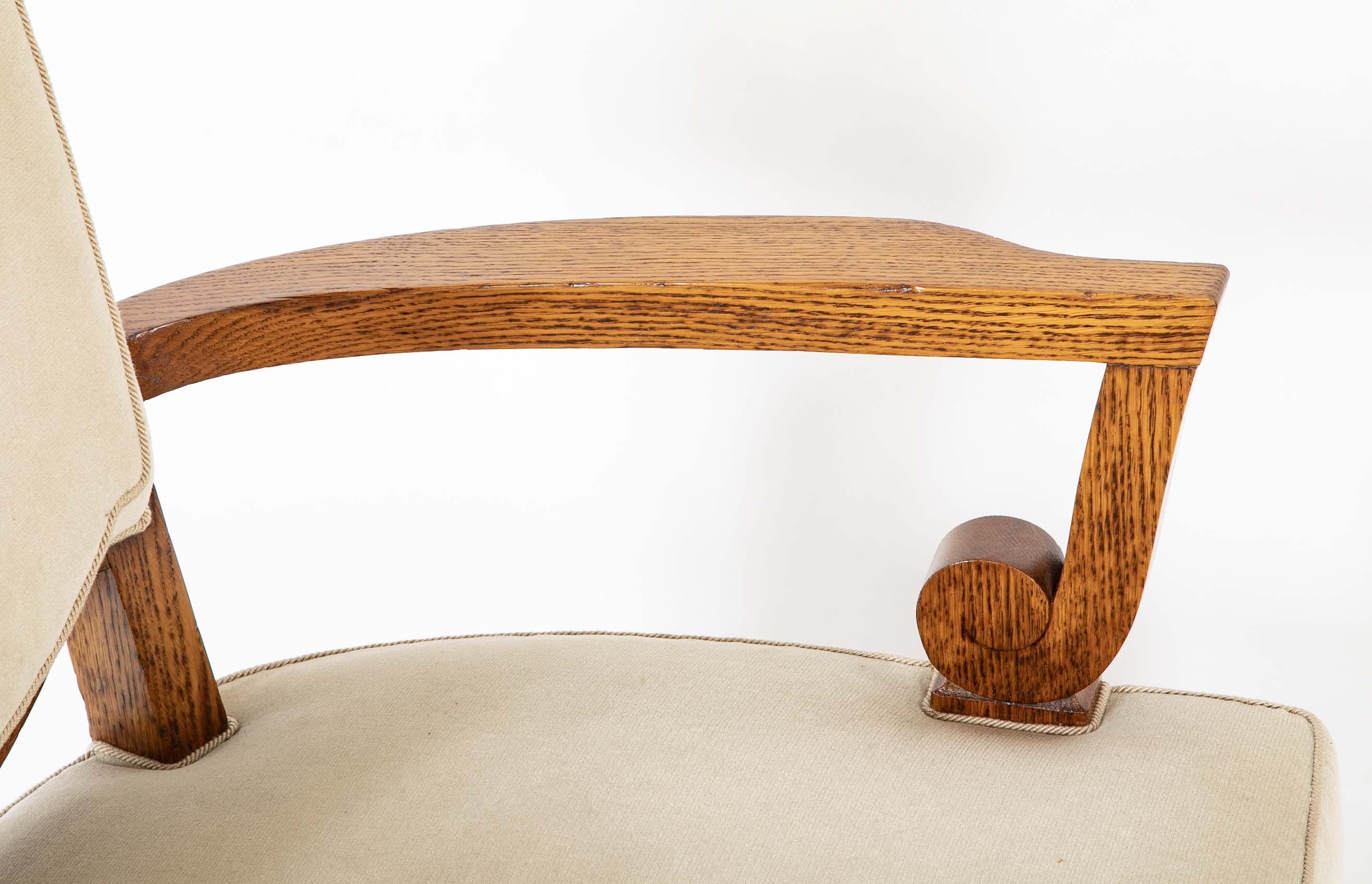 Pair of Jules Leleu Waxed Oak Armchairs