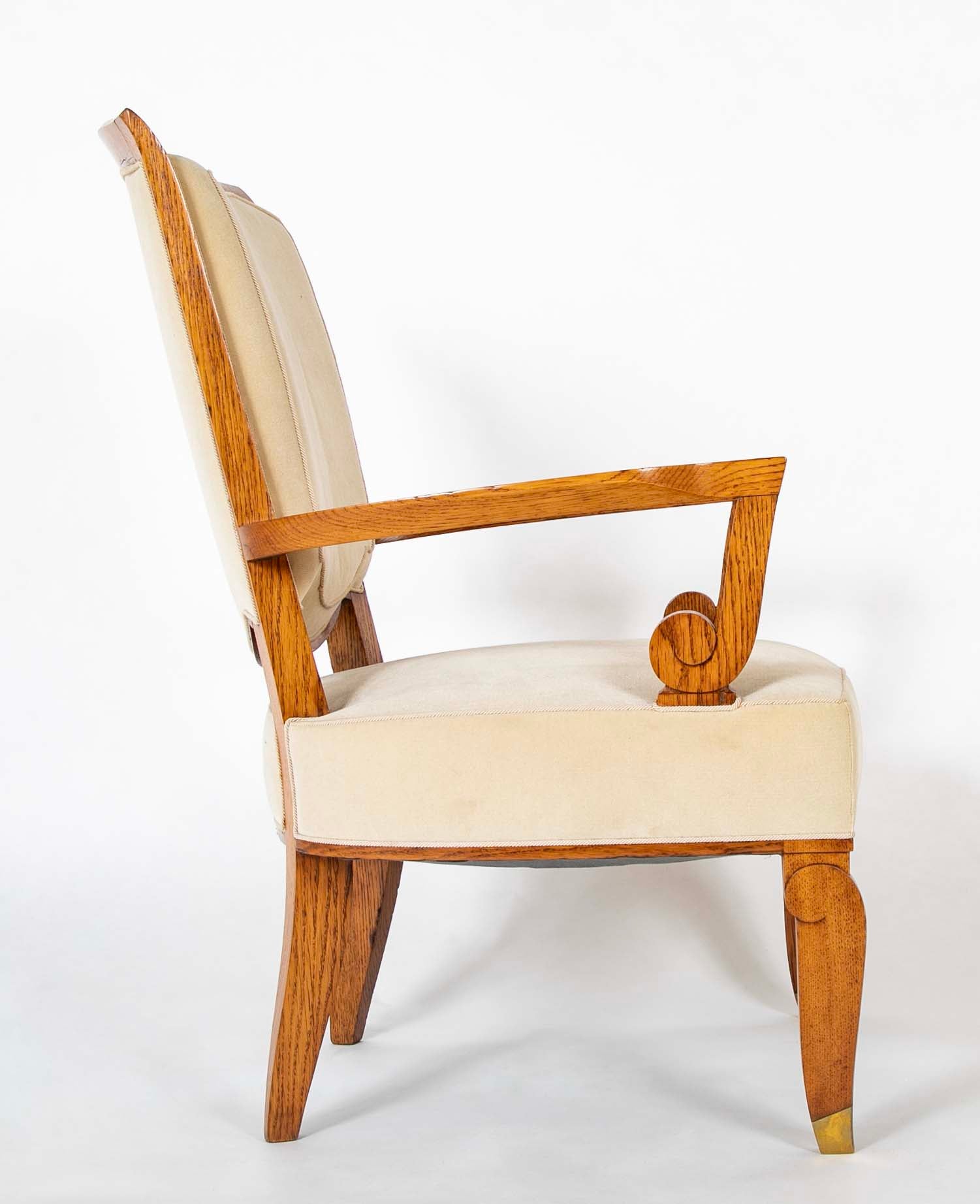 Pair of Jules Leleu Waxed Oak Armchairs