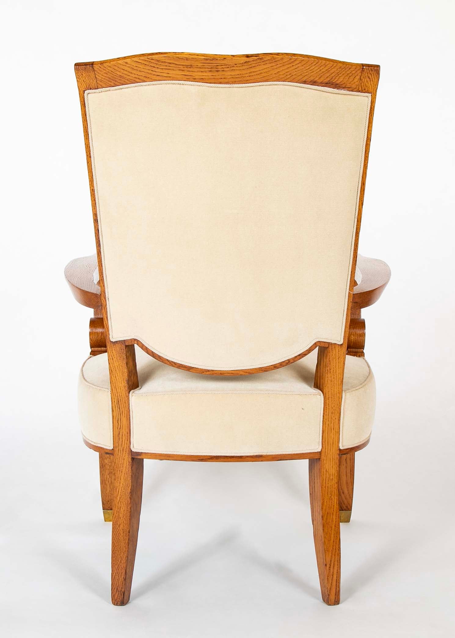 Pair of Jules Leleu Waxed Oak Armchairs