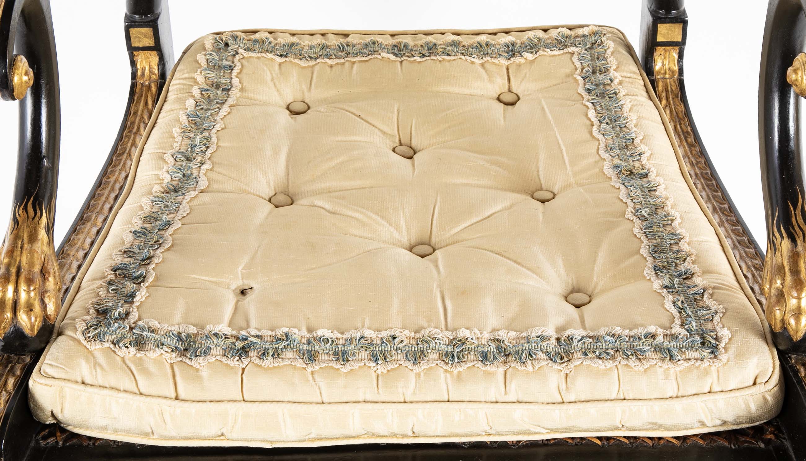 A Pair of Regency Style Ebonized and Parcel Gilt Armchairs