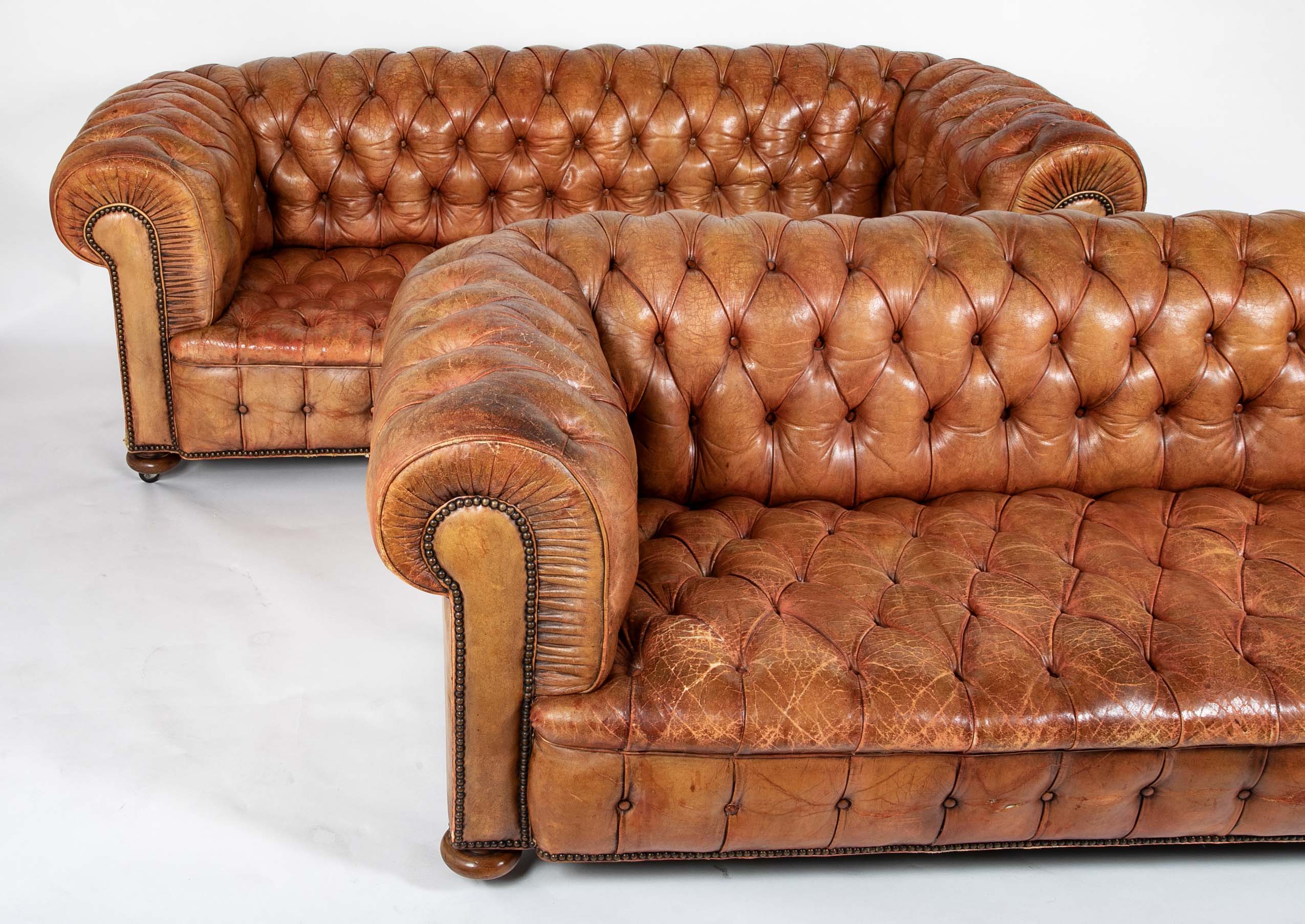 Pair of Mid 20th Century English Chesterfield Sofas in Coral Leather