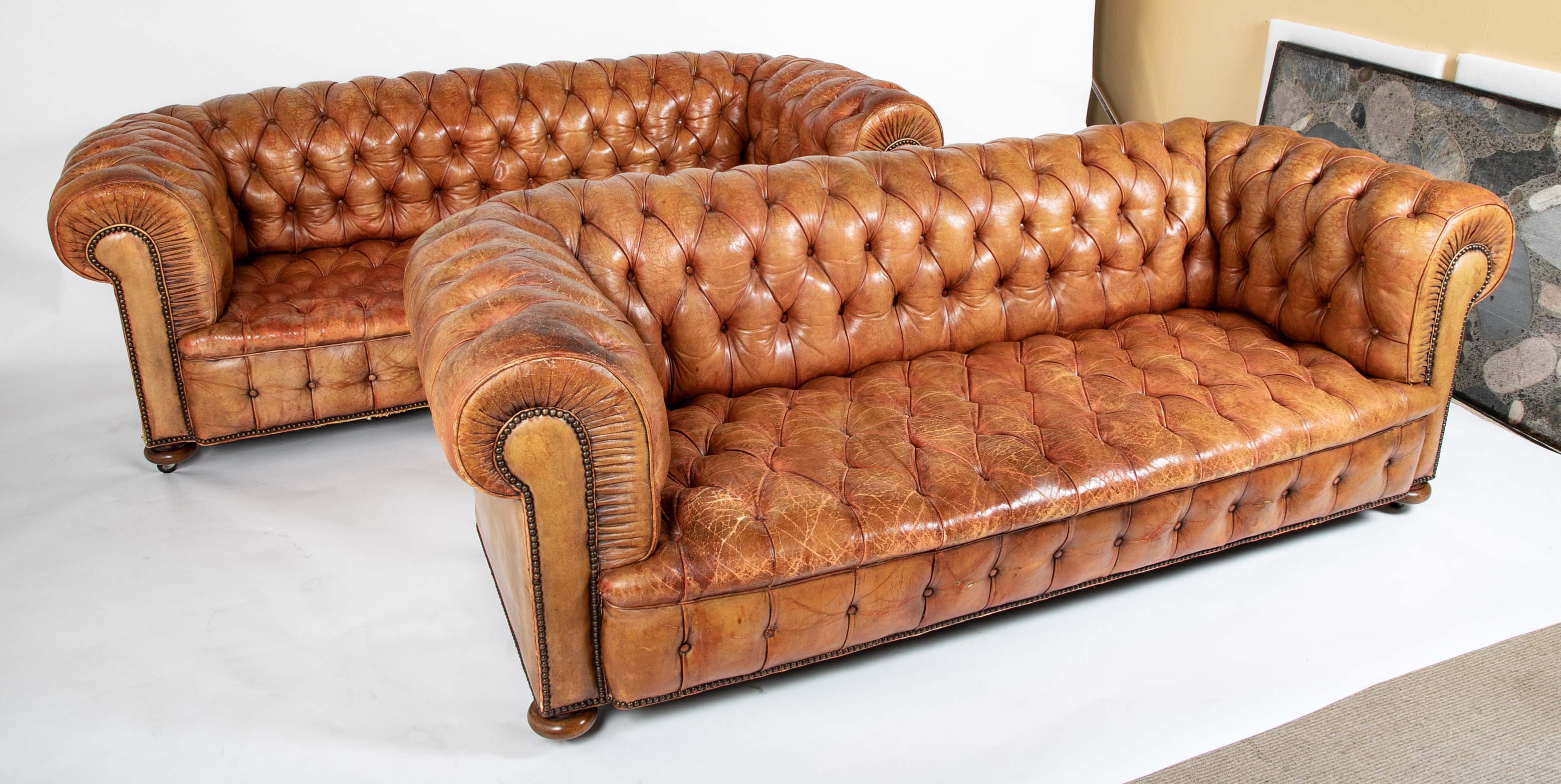 Pair of Mid 20th Century English Chesterfield Sofas in Coral Leather