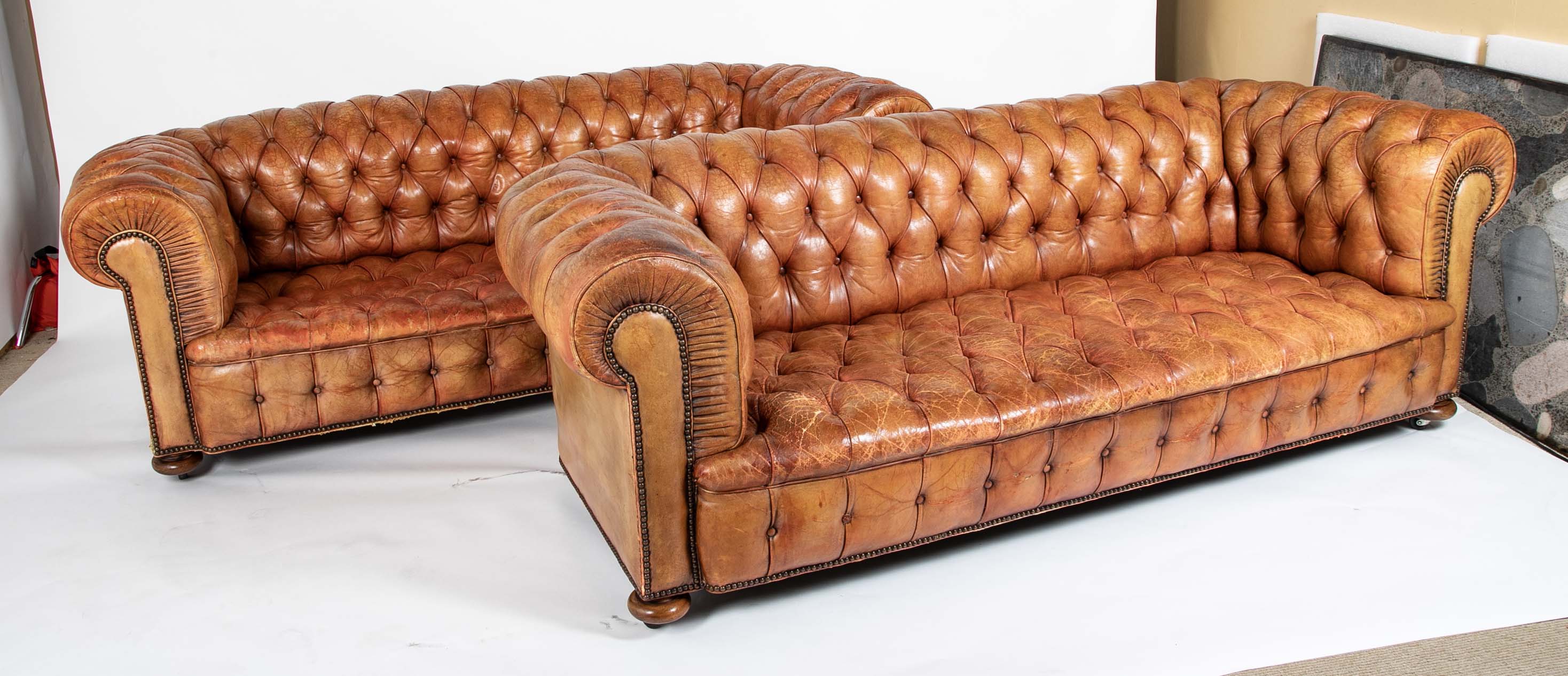 Pair of Mid 20th Century English Chesterfield Sofas in Coral Leather