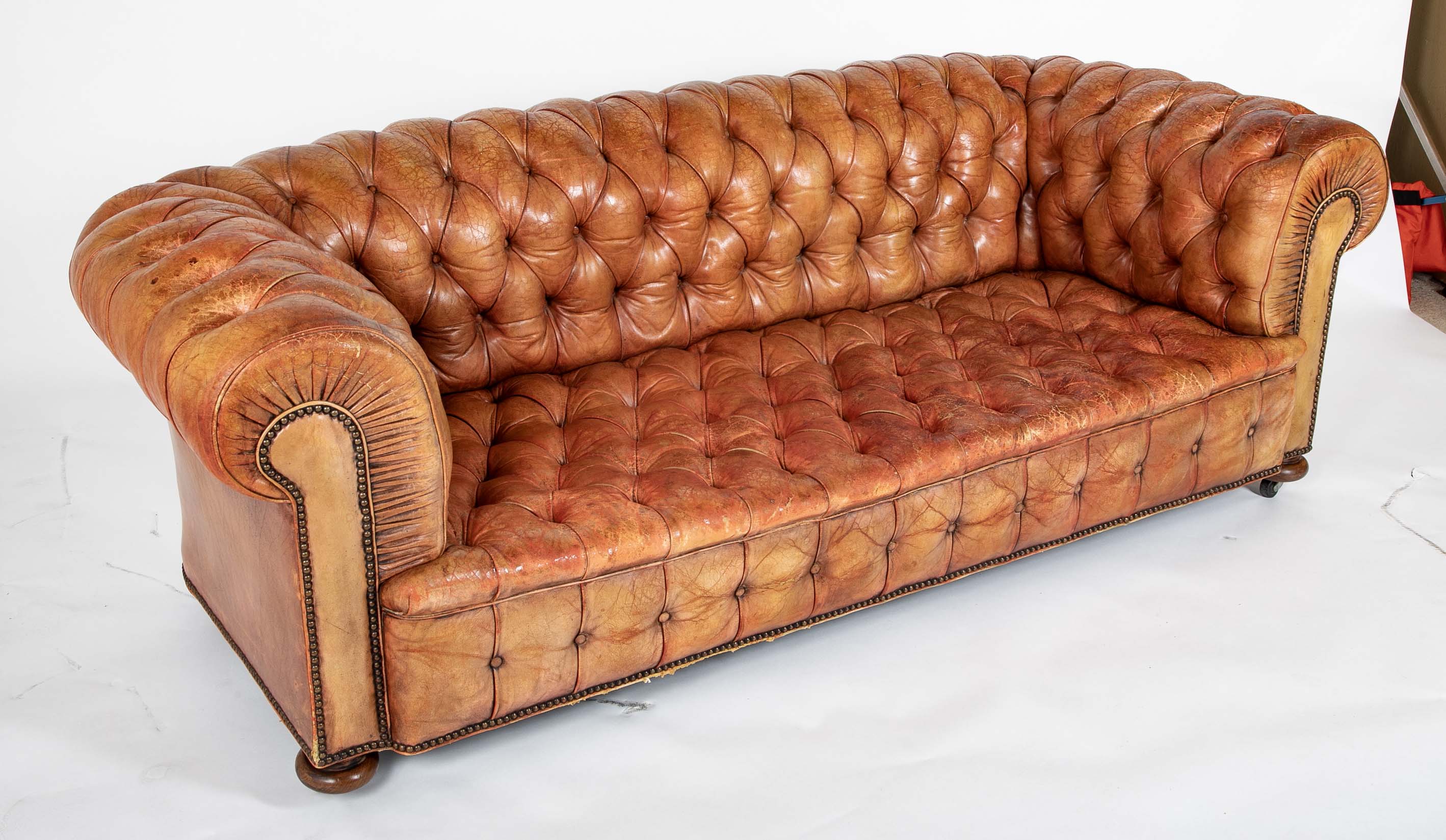 Pair of Mid 20th Century English Chesterfield Sofas in Coral Leather