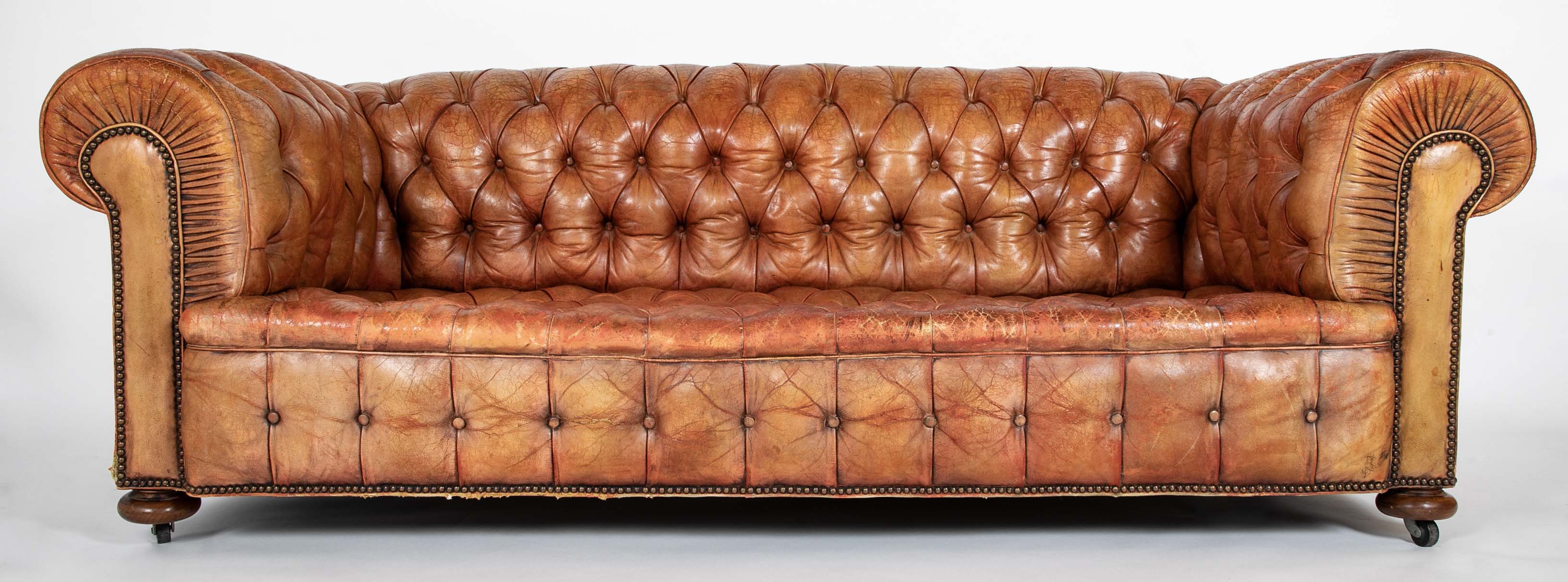 Pair of Mid 20th Century English Chesterfield Sofas in Coral Leather