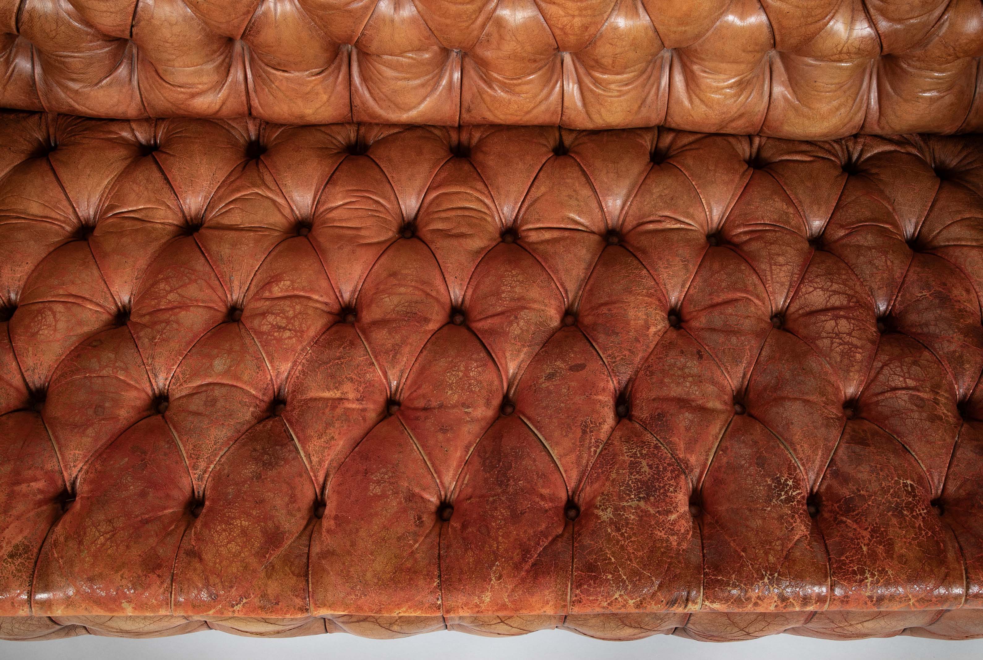 Pair of Mid 20th Century English Chesterfield Sofas in Coral Leather
