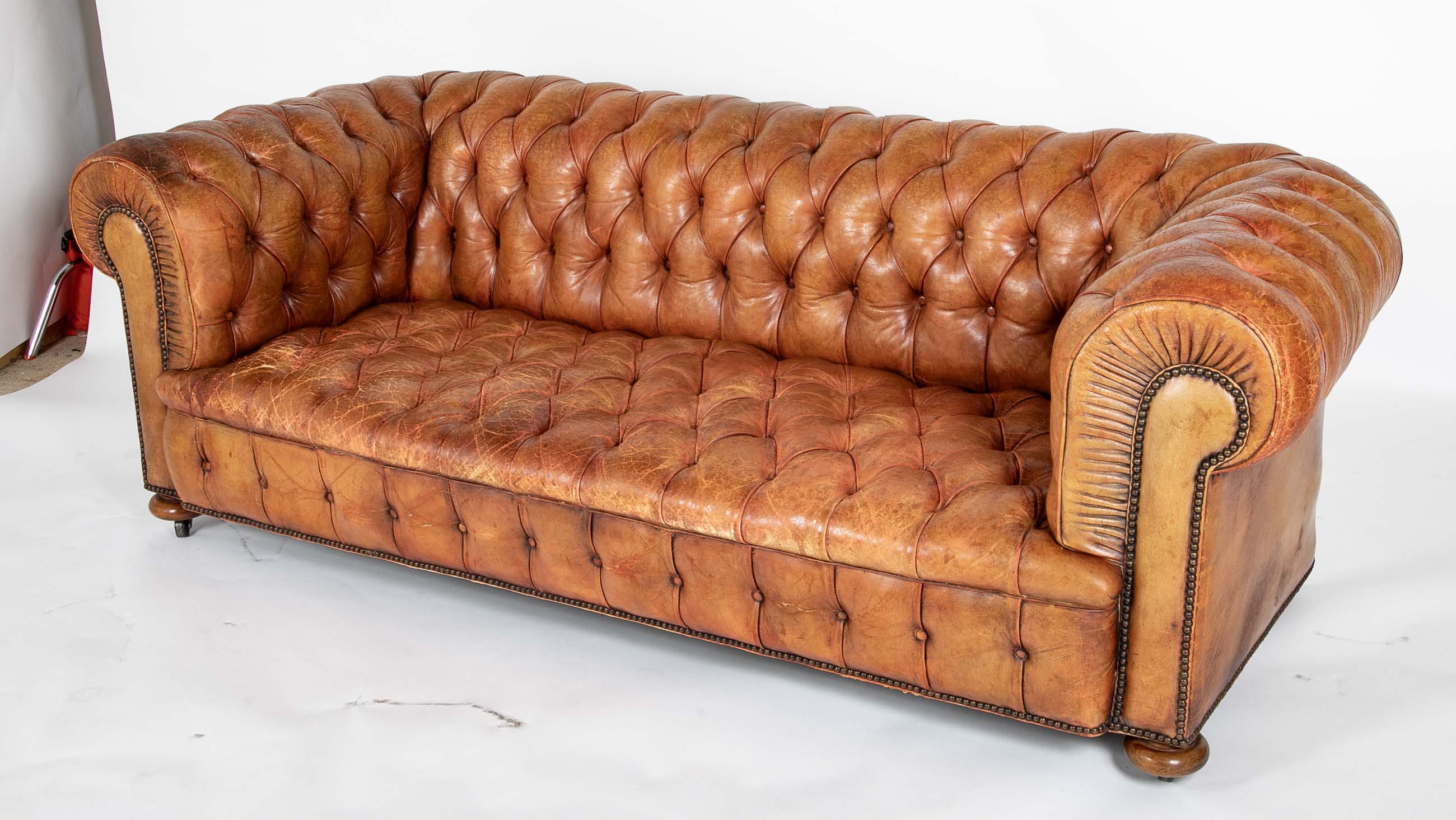 Pair of Mid 20th Century English Chesterfield Sofas in Coral Leather