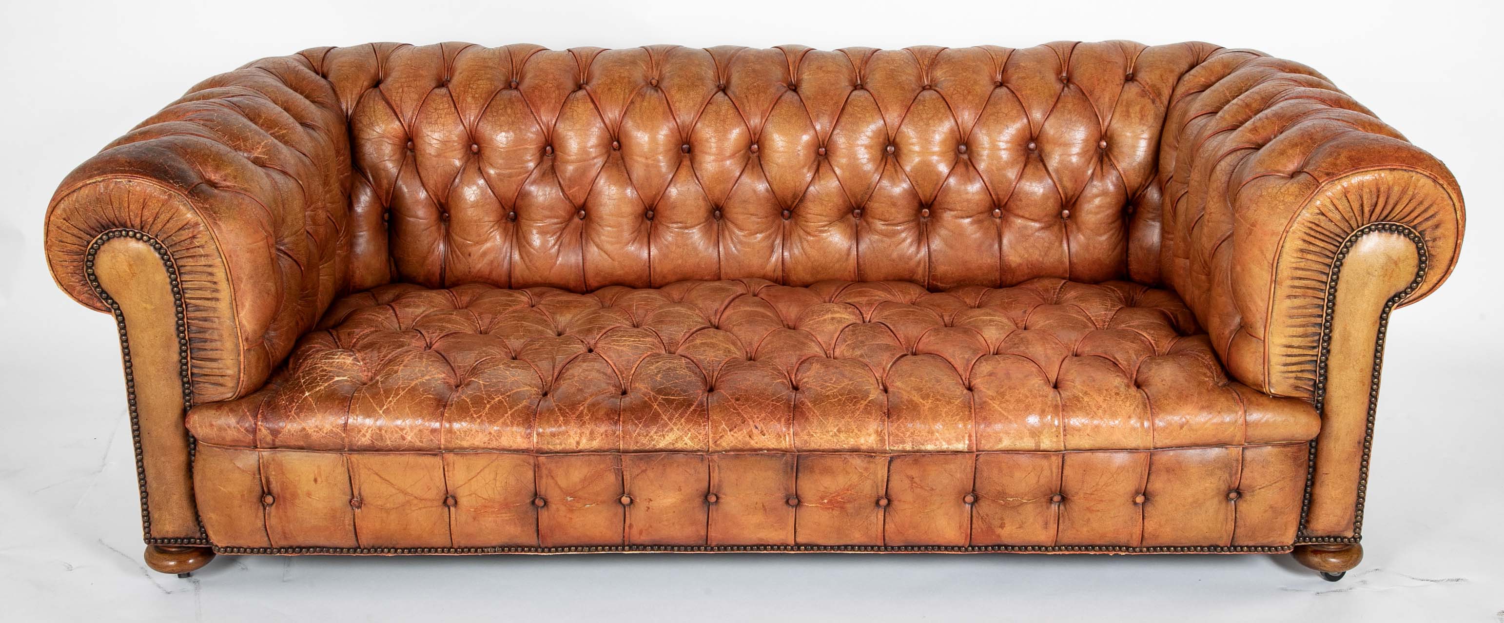 Pair of Mid 20th Century English Chesterfield Sofas in Coral Leather