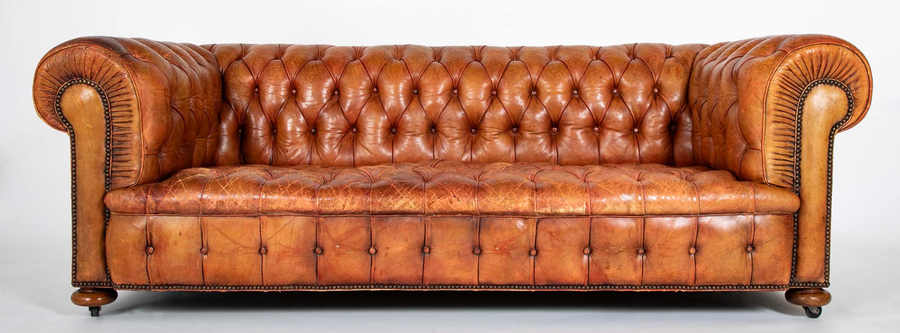 Pair of Mid 20th Century English Chesterfield Sofas in Coral Leather
