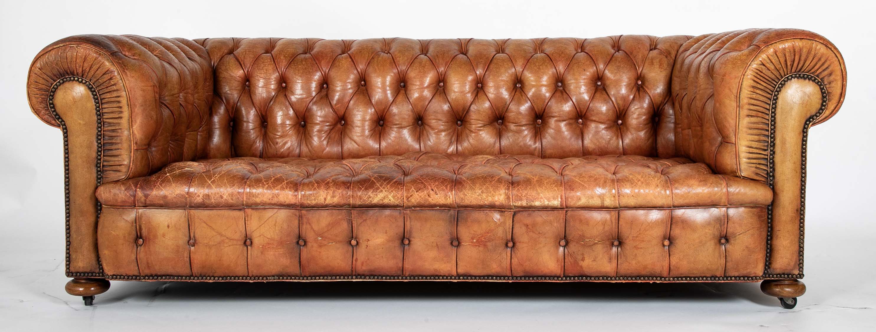 Pair of Mid 20th Century English Chesterfield Sofas in Coral Leather