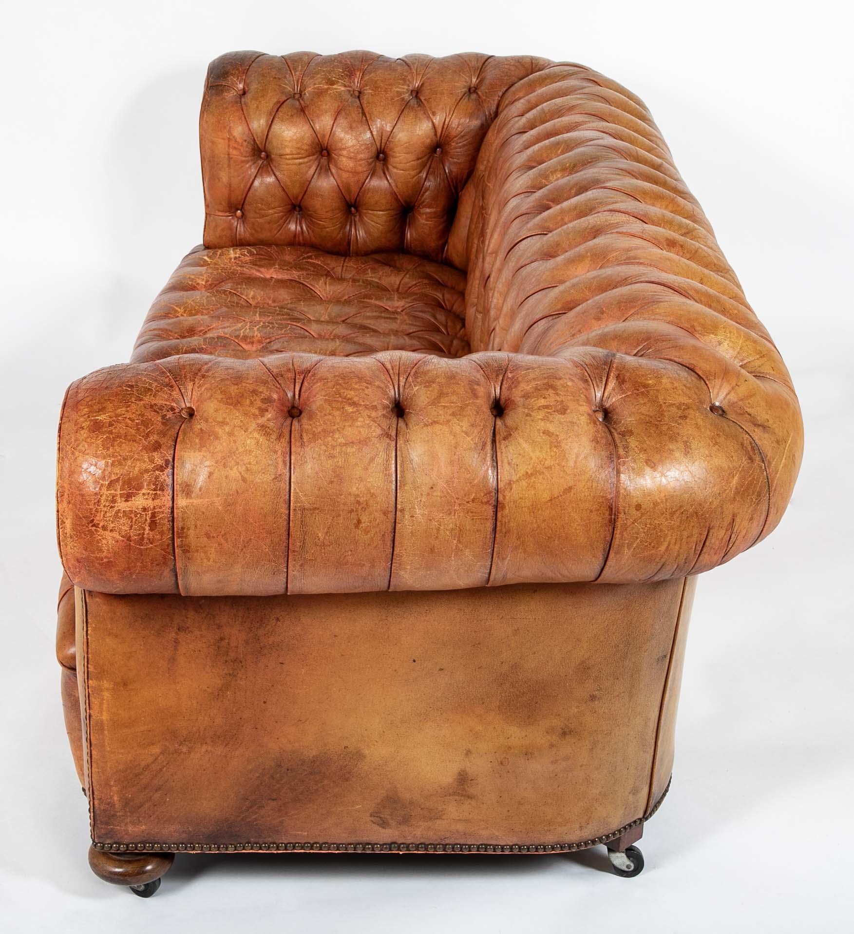 Pair of Mid 20th Century English Chesterfield Sofas in Coral Leather