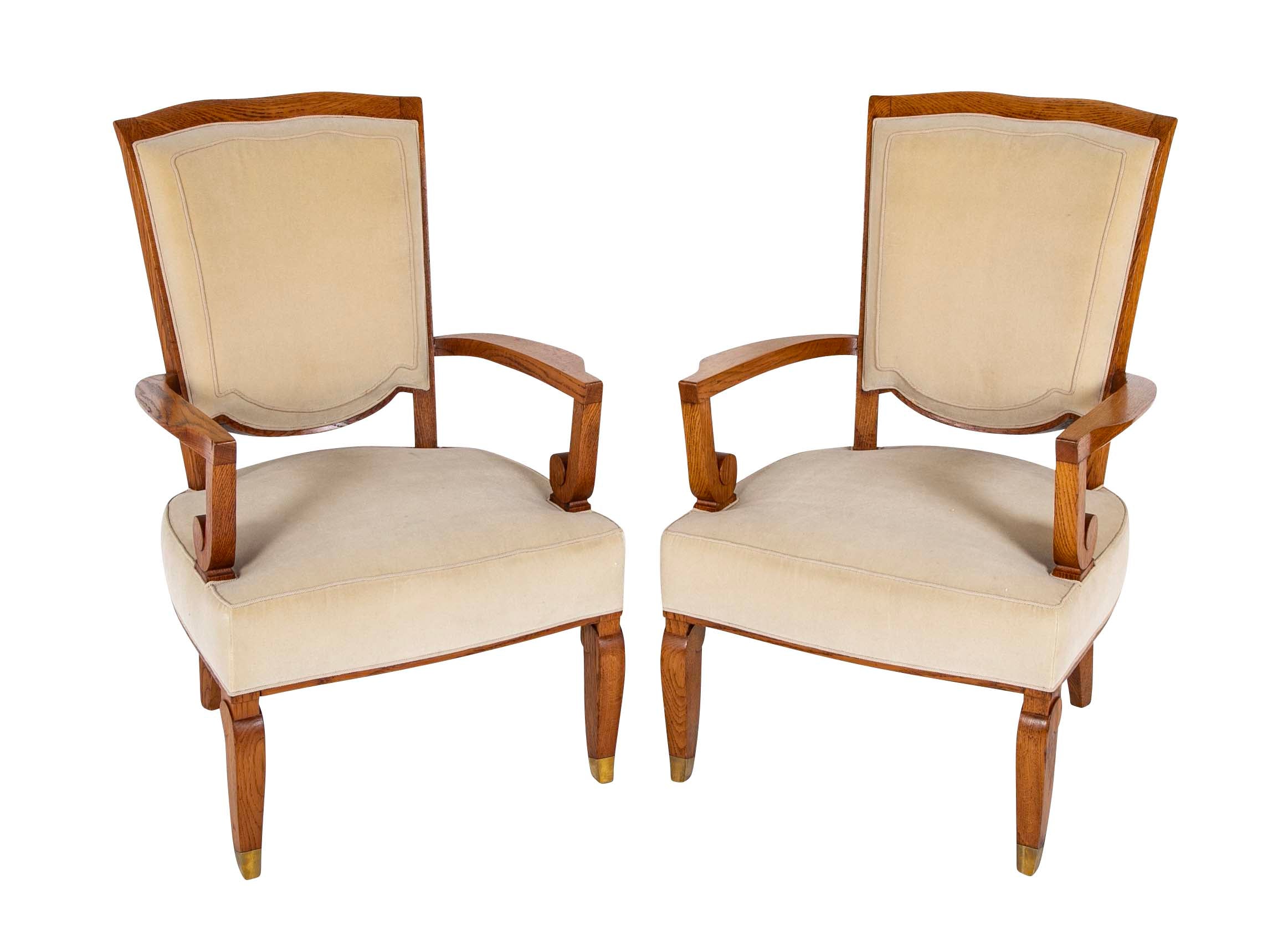 Pair of Jules Leleu Waxed Oak Armchairs