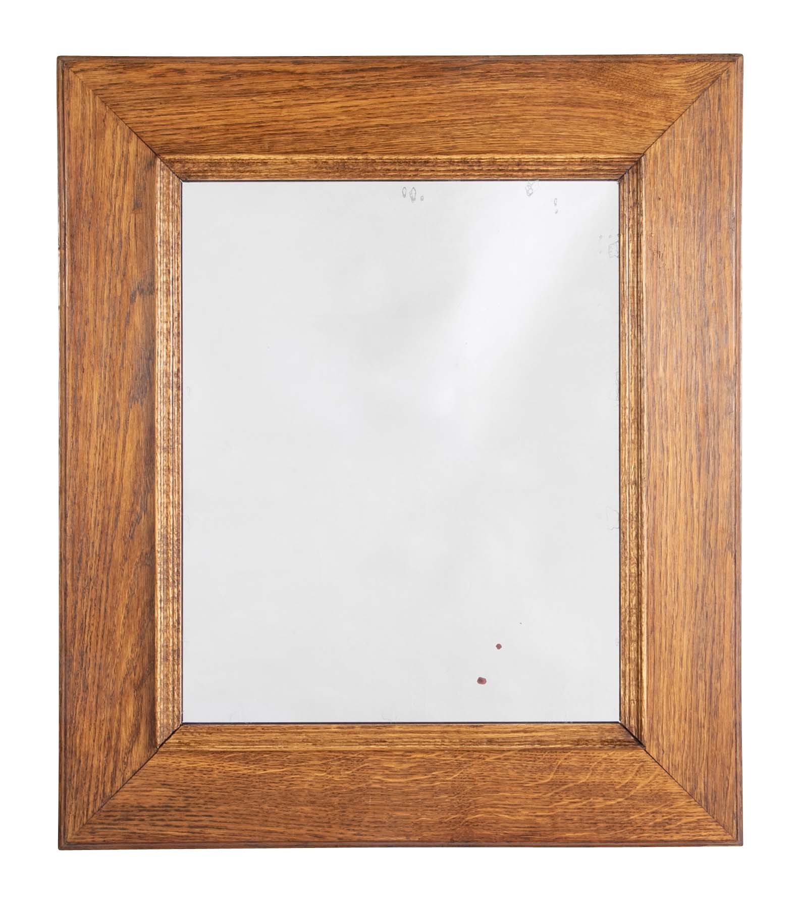Early 20th Century French Natural Form Molded Oak Framed Mirror