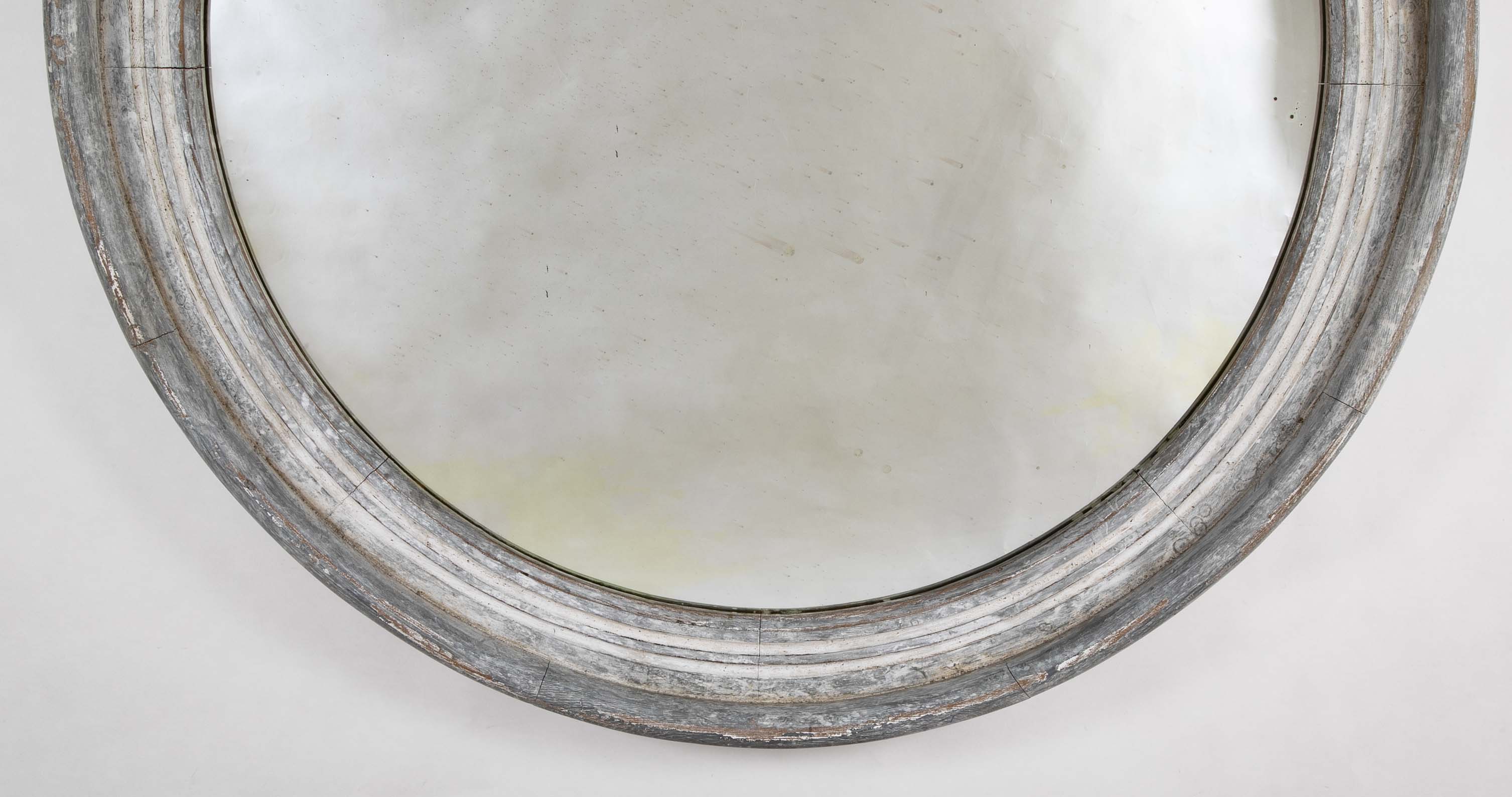 A Round Swedish Mirror with Whitewashed & Patinated Heavy Wood Frame