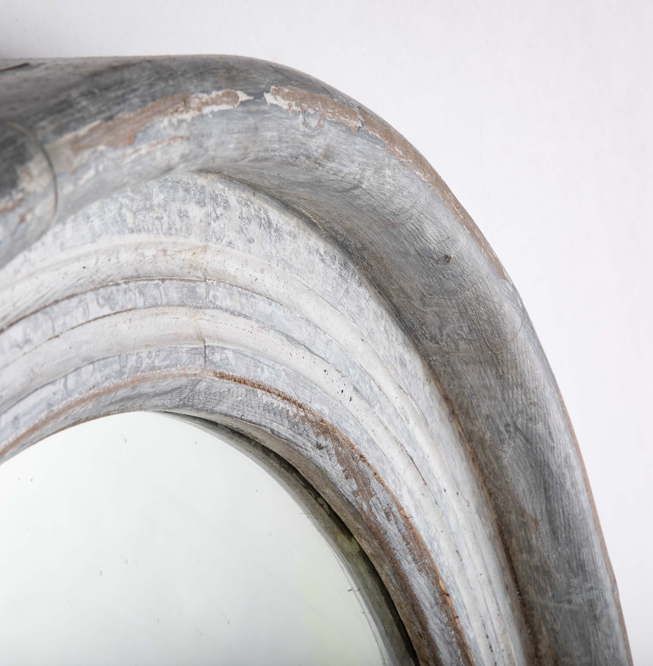 A Round Swedish Mirror with Whitewashed & Patinated Heavy Wood Frame
