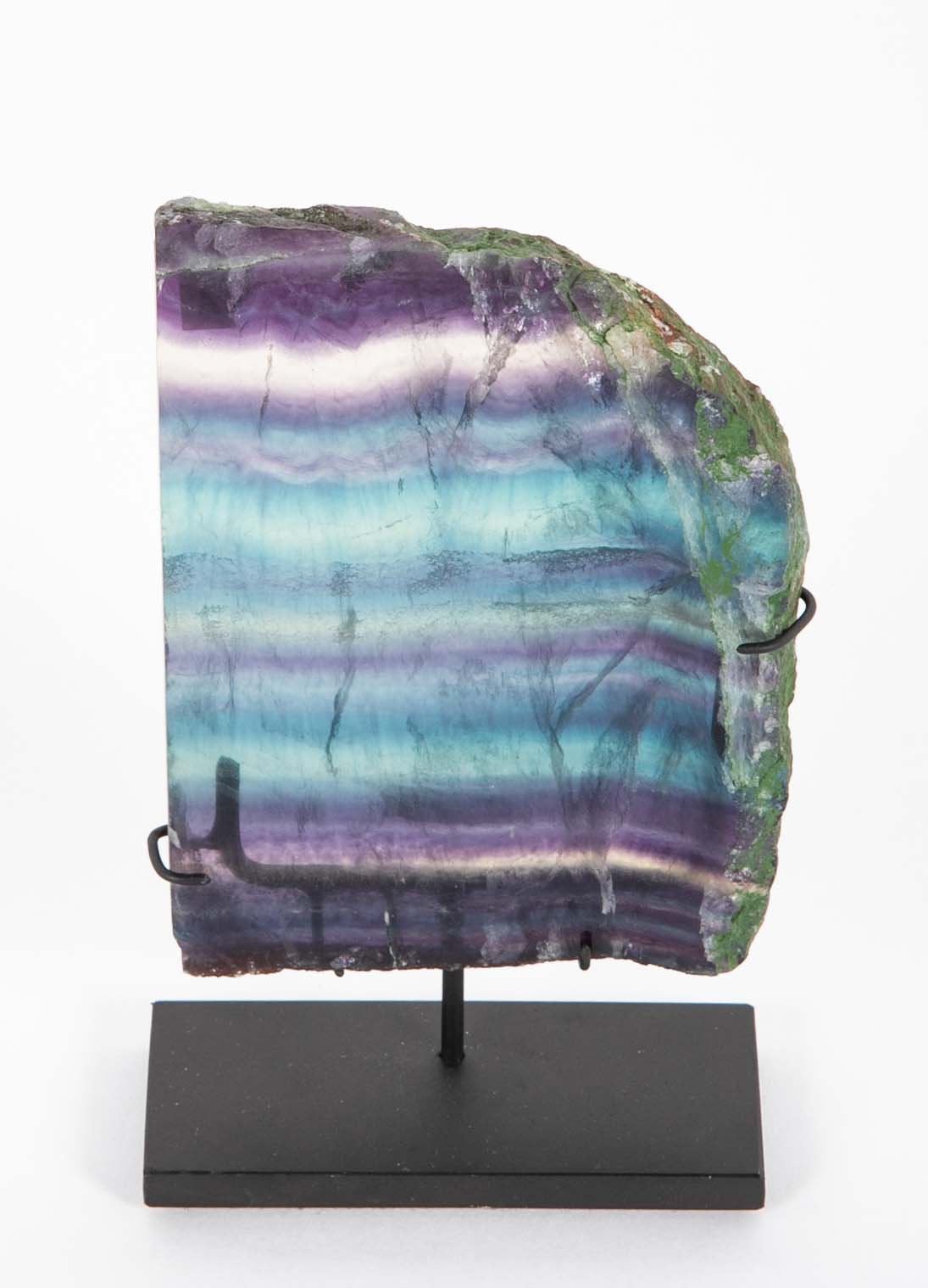 Blue, Purple and Transparent Striated Fluorite Slab on Modern Stand