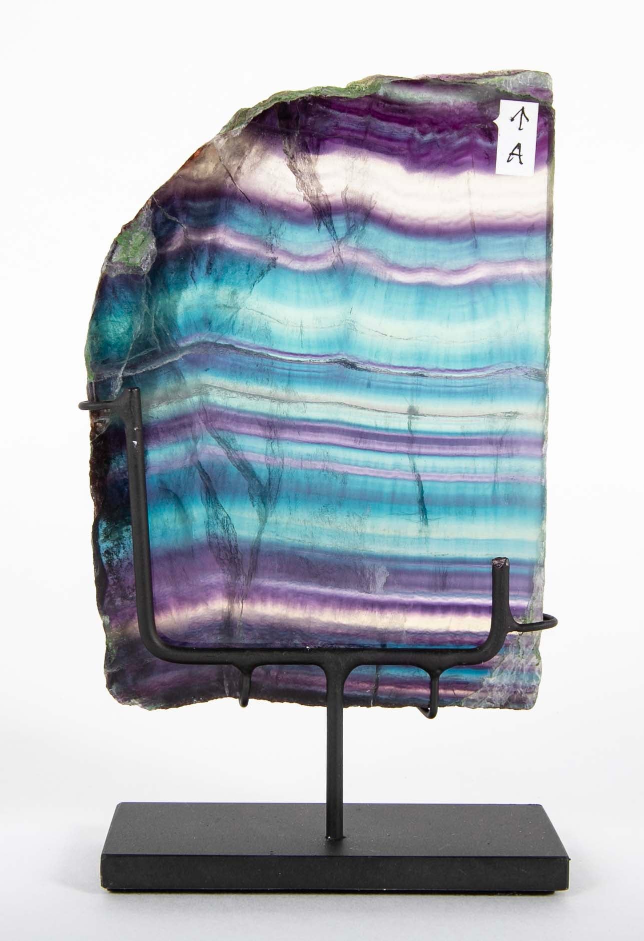 Blue, Purple and Transparent Striated Fluorite Slab on Modern Stand