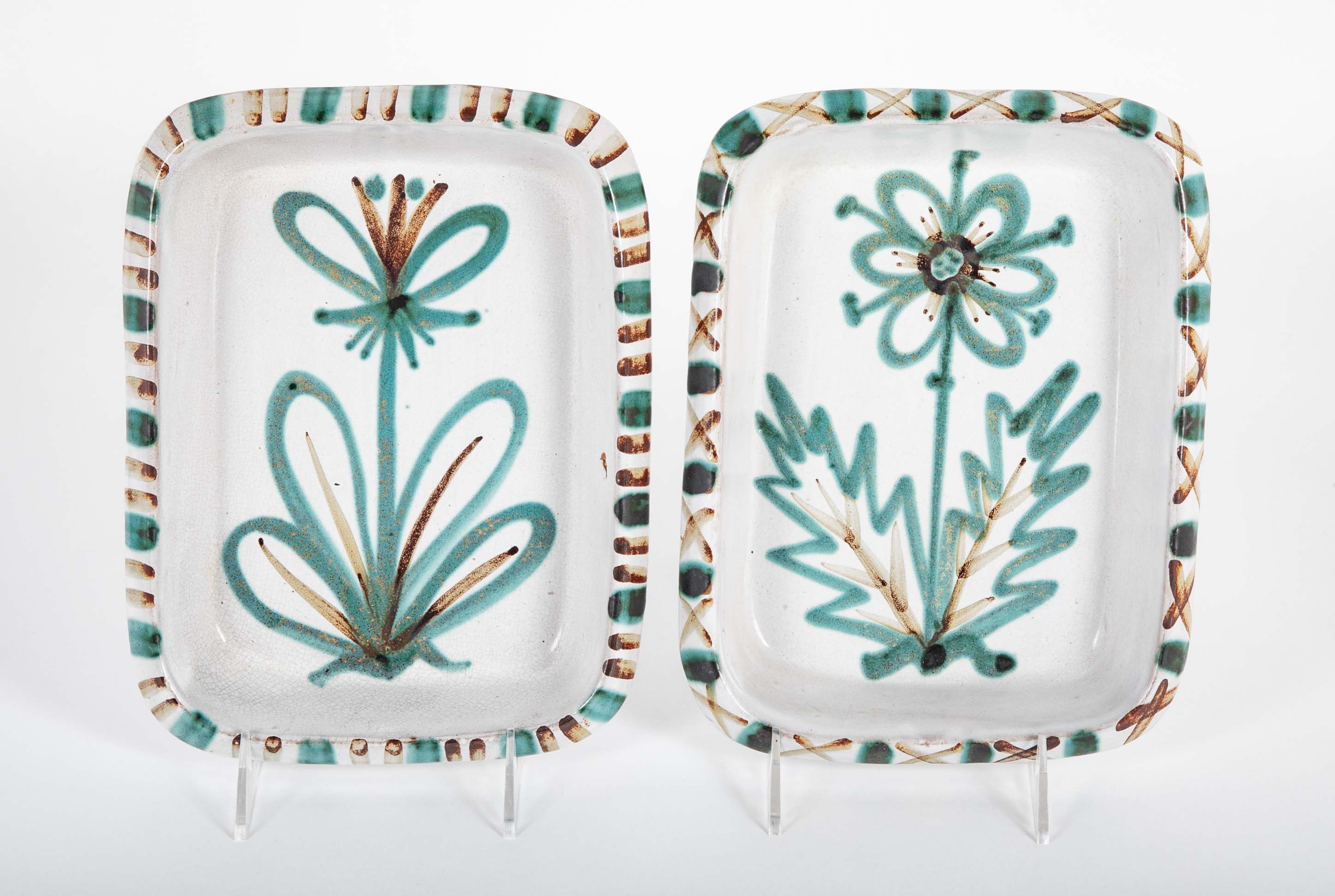 Pair of Ceramic Dishes with Center Flower on White by Robert Picault