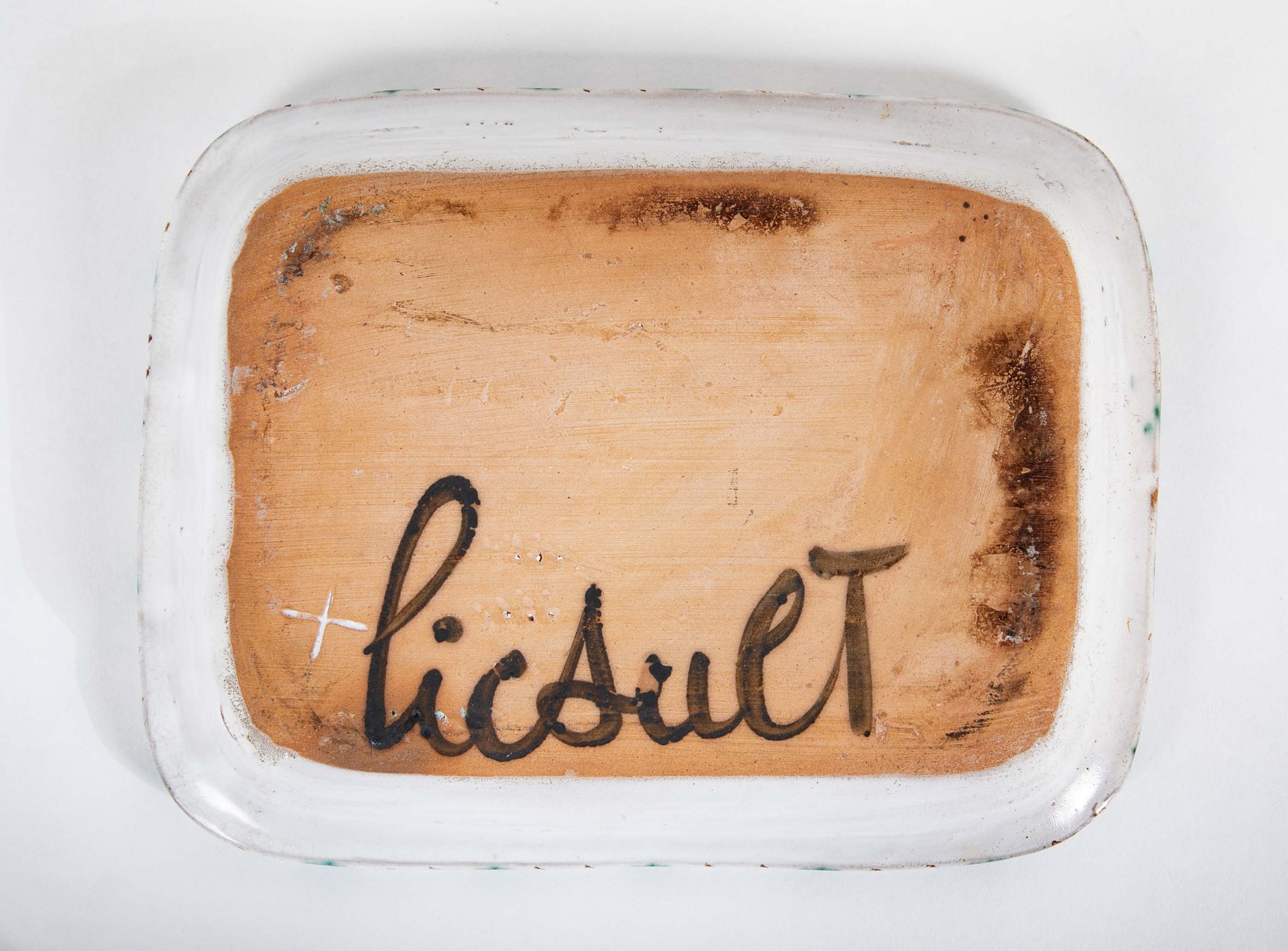 Pair of Ceramic Dishes with Center Flower on White by Robert Picault